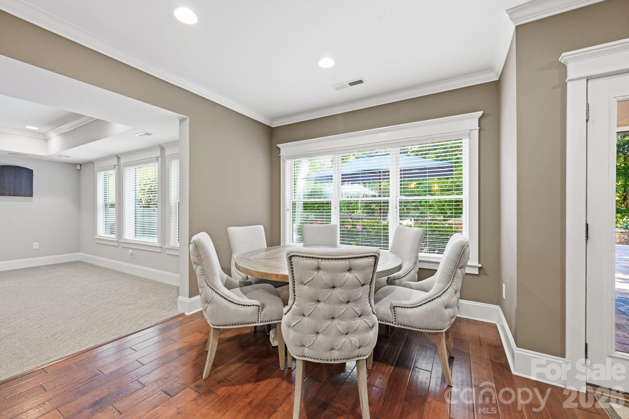 Dining Area Overlooks the Pool & Back Yard - 121 E Callicutt Trail, Mooresville