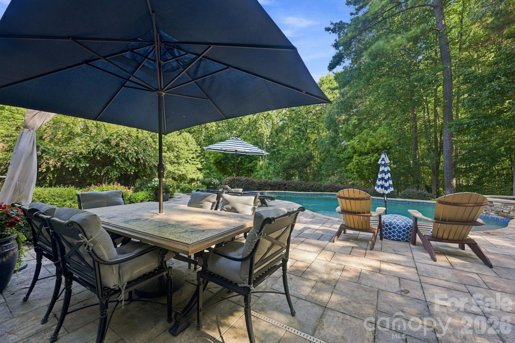 Plenty of Space for Patio Dining & Relaxing on the Pool Deck - 121 E Callicutt Trail, Mooresville