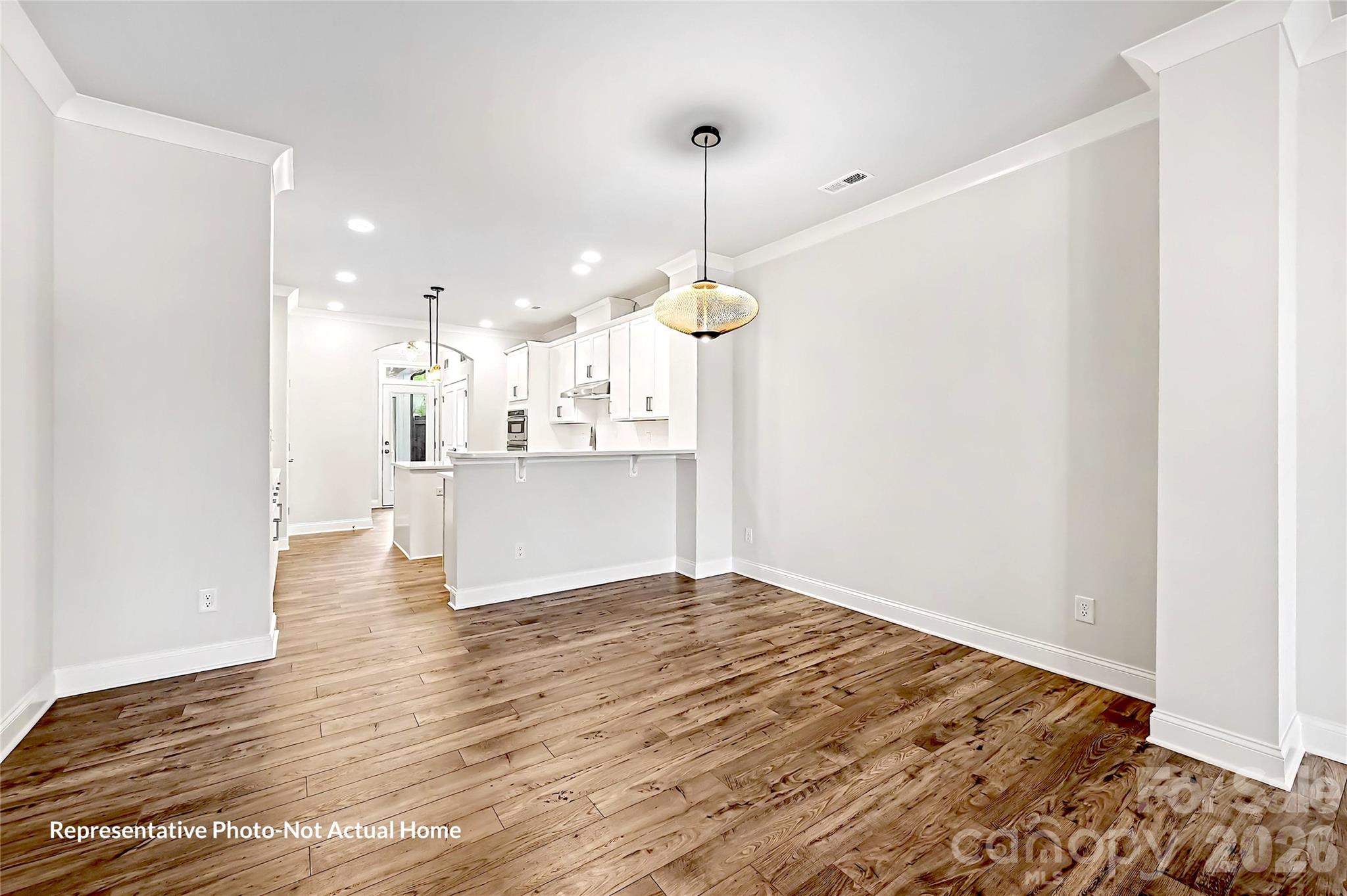 Dining to Kitchen-Bordeaux - 10231 Rainier Trail Drive NW, Huntersville
