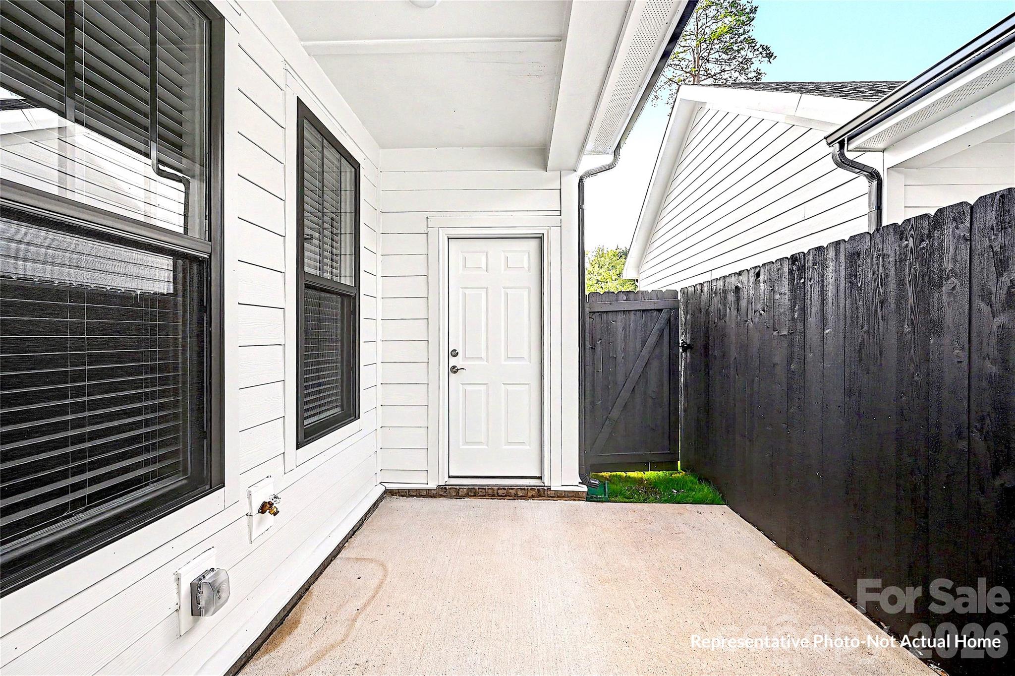 Patio with privacy fence-Bordeaux - 10231 Rainier Trail Drive NW, Huntersville