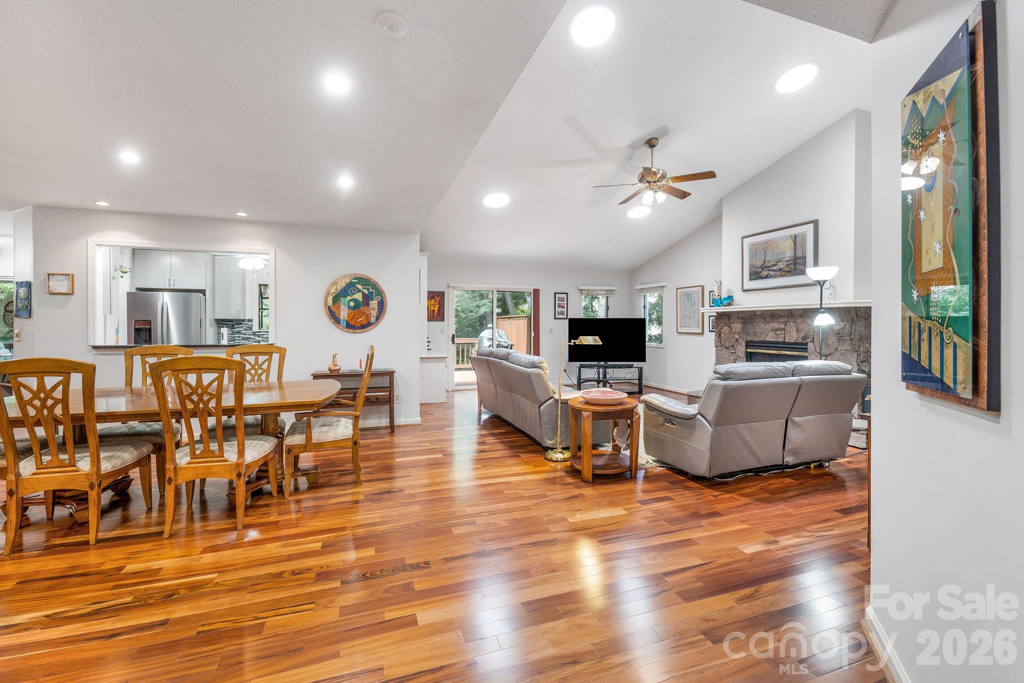 There is an open flow between the entry, dining area, and living room. - 31 Hillcreek Drive, Asheville