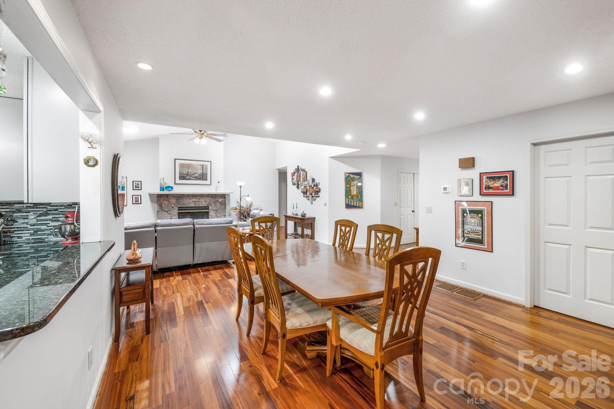 The pass through between the kitchen and dining make entertaining a breeze! - 31 Hillcreek Drive, Asheville