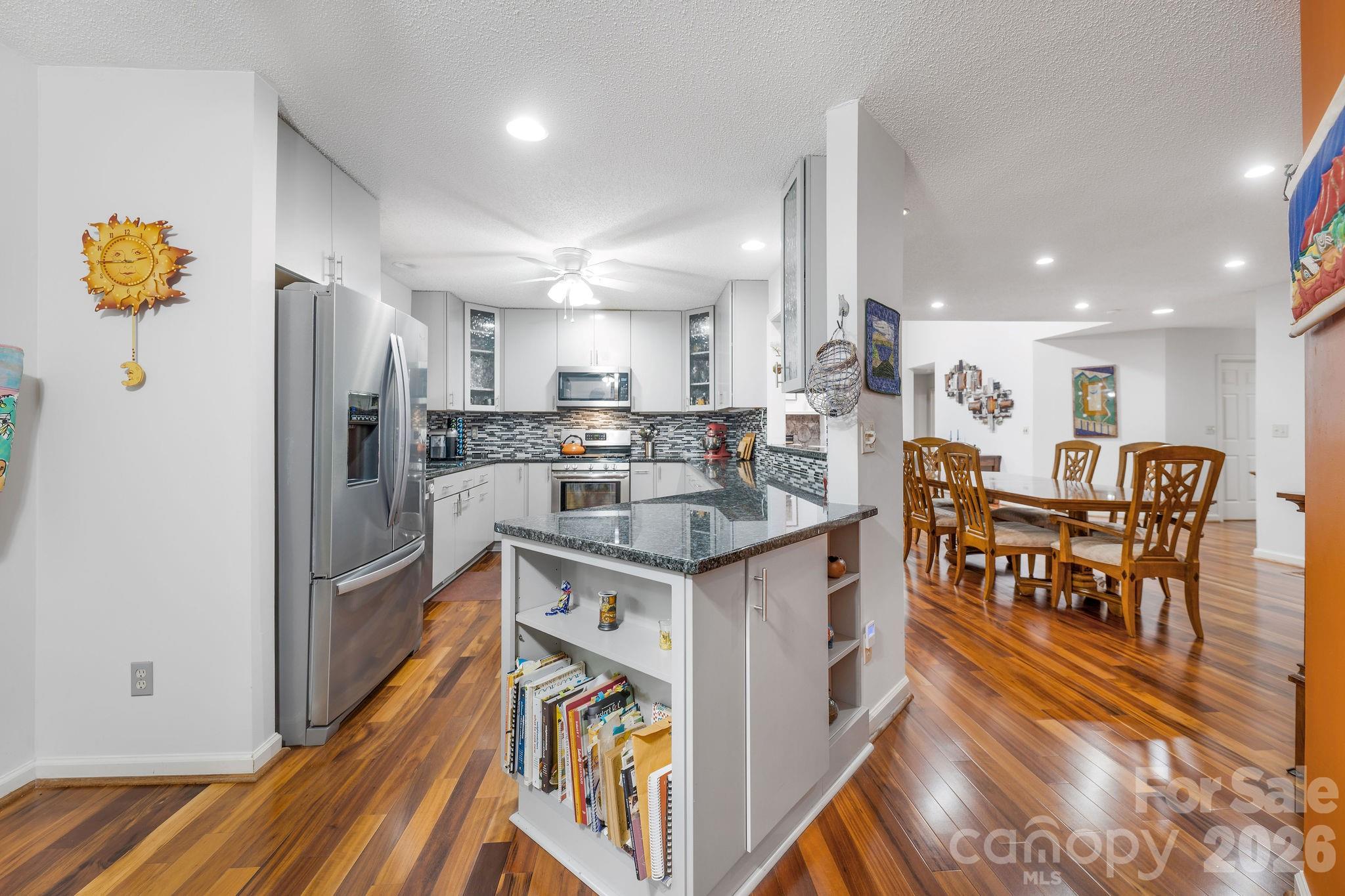 The renovated kitchen has plenty of storage! - 31 Hillcreek Drive, Asheville