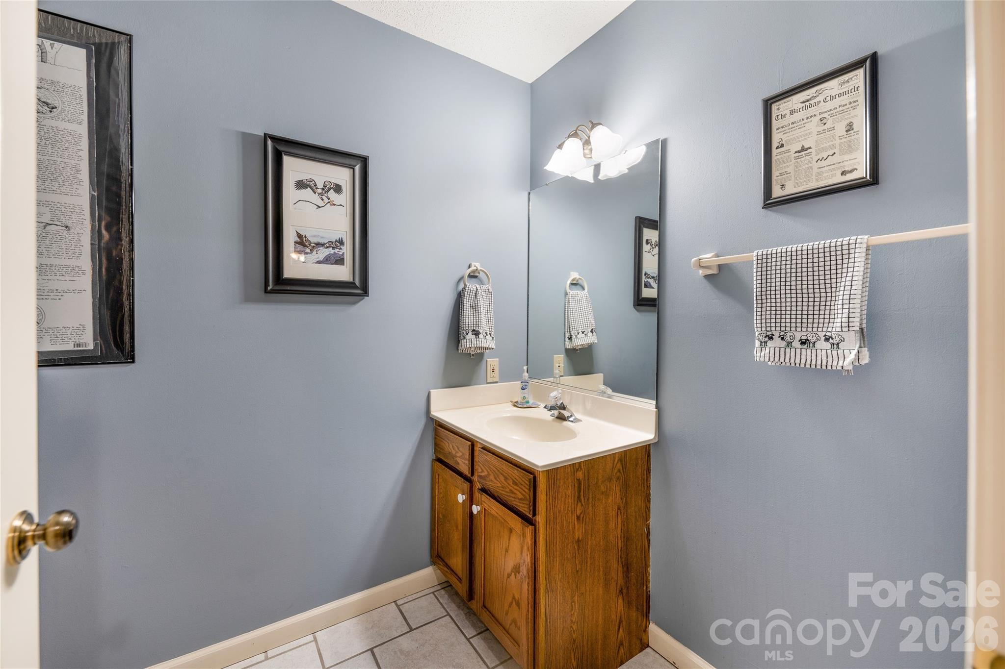 Half-bath by entry. - 31 Hillcreek Drive, Asheville