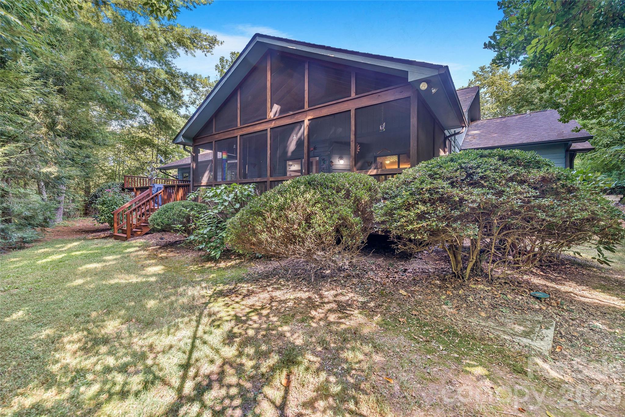 The screen porch from the exterior. - 31 Hillcreek Drive, Asheville