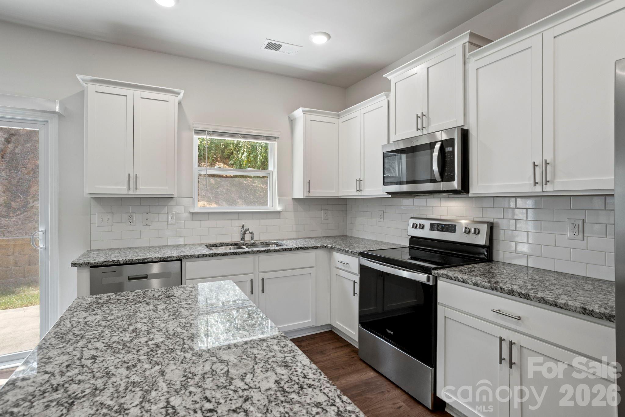 Single Family Residence at 138 Marathon Lane, Candler, photo 12 of 47