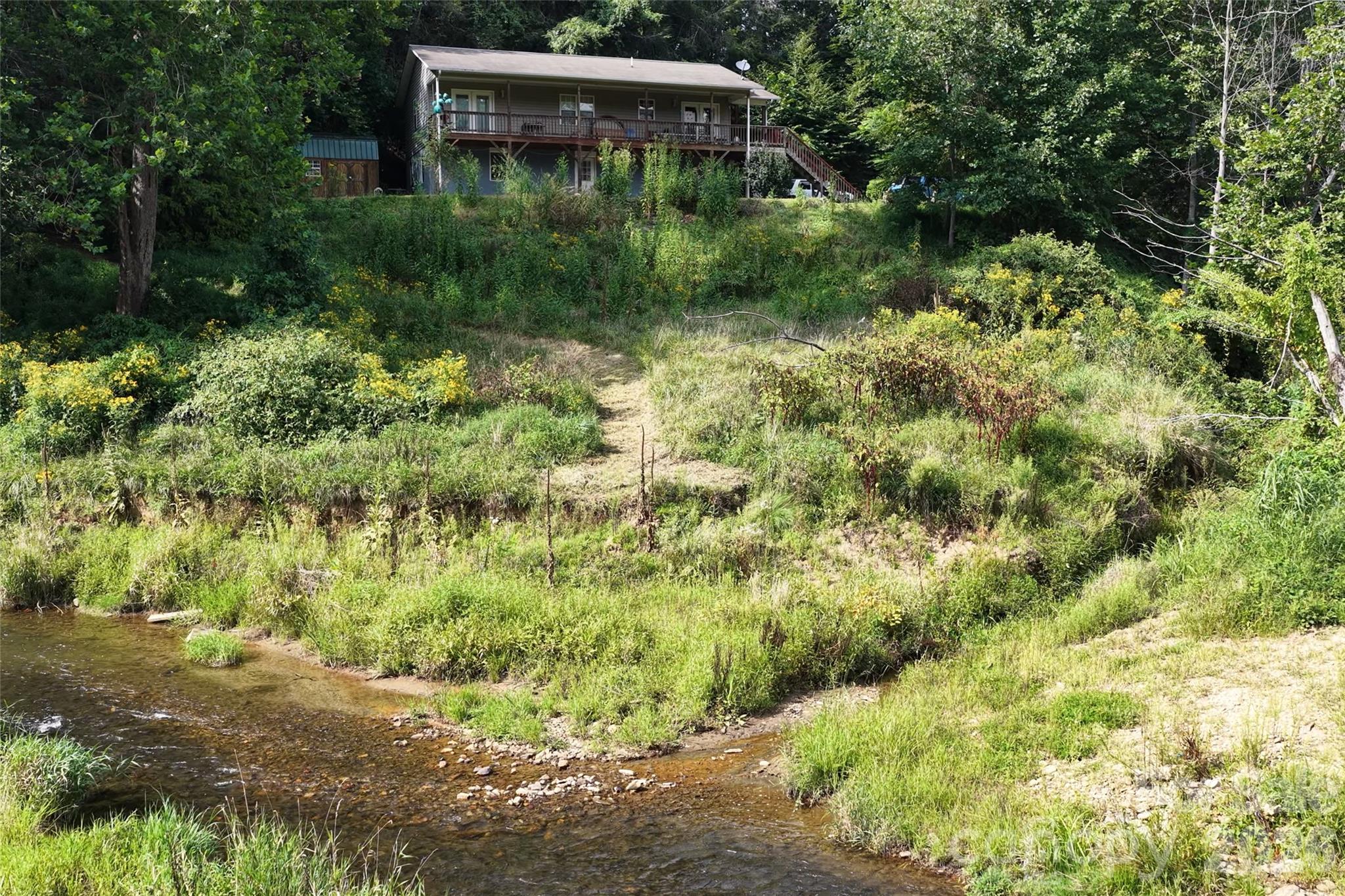 Walk or drive a golf cart down to the waters edge. - 791 Mckinney Road, Burnsville