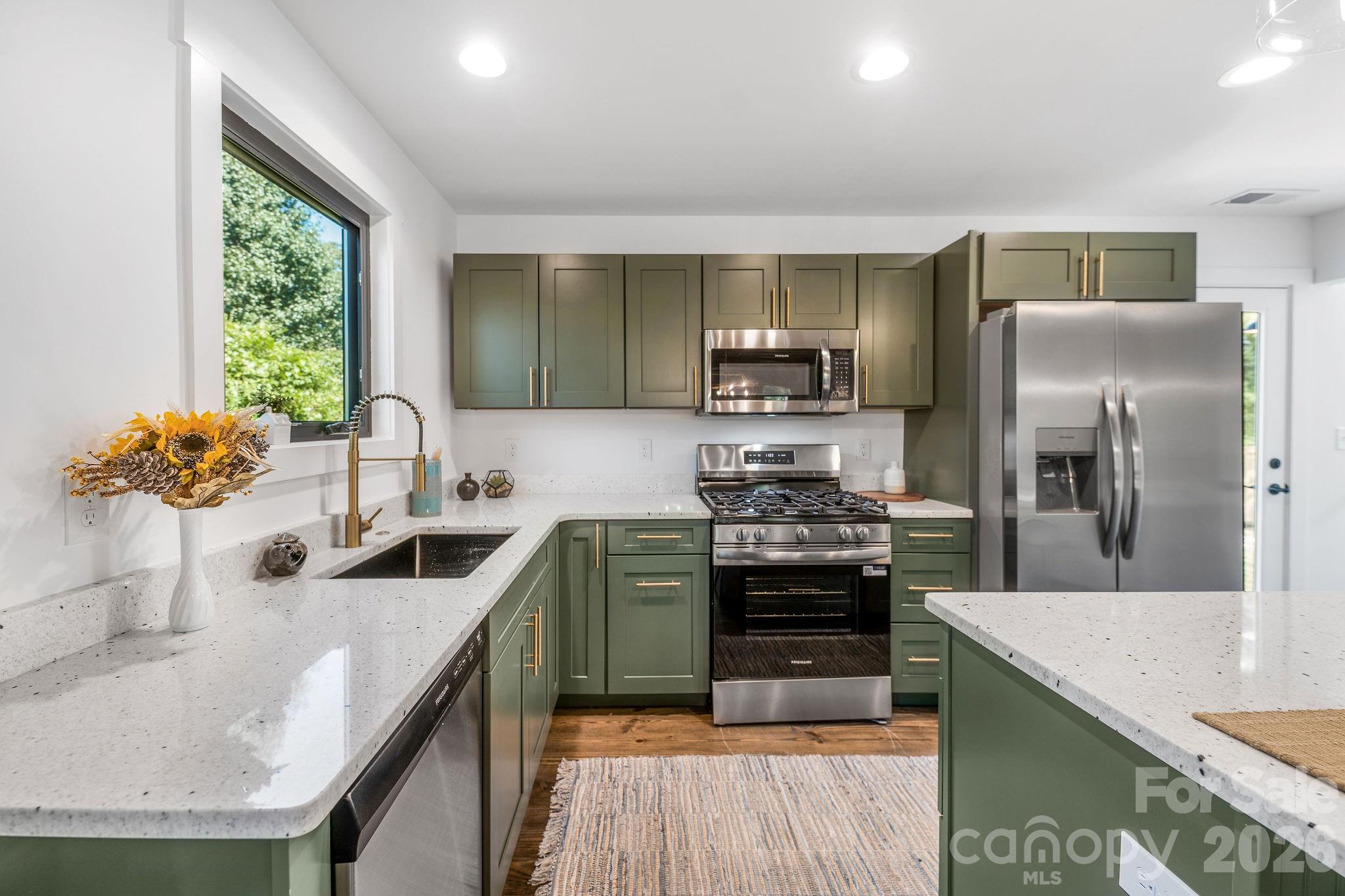 Beautiful Granite Countertops and Customized Cabinetry - 138 Shiloh Road, Asheville