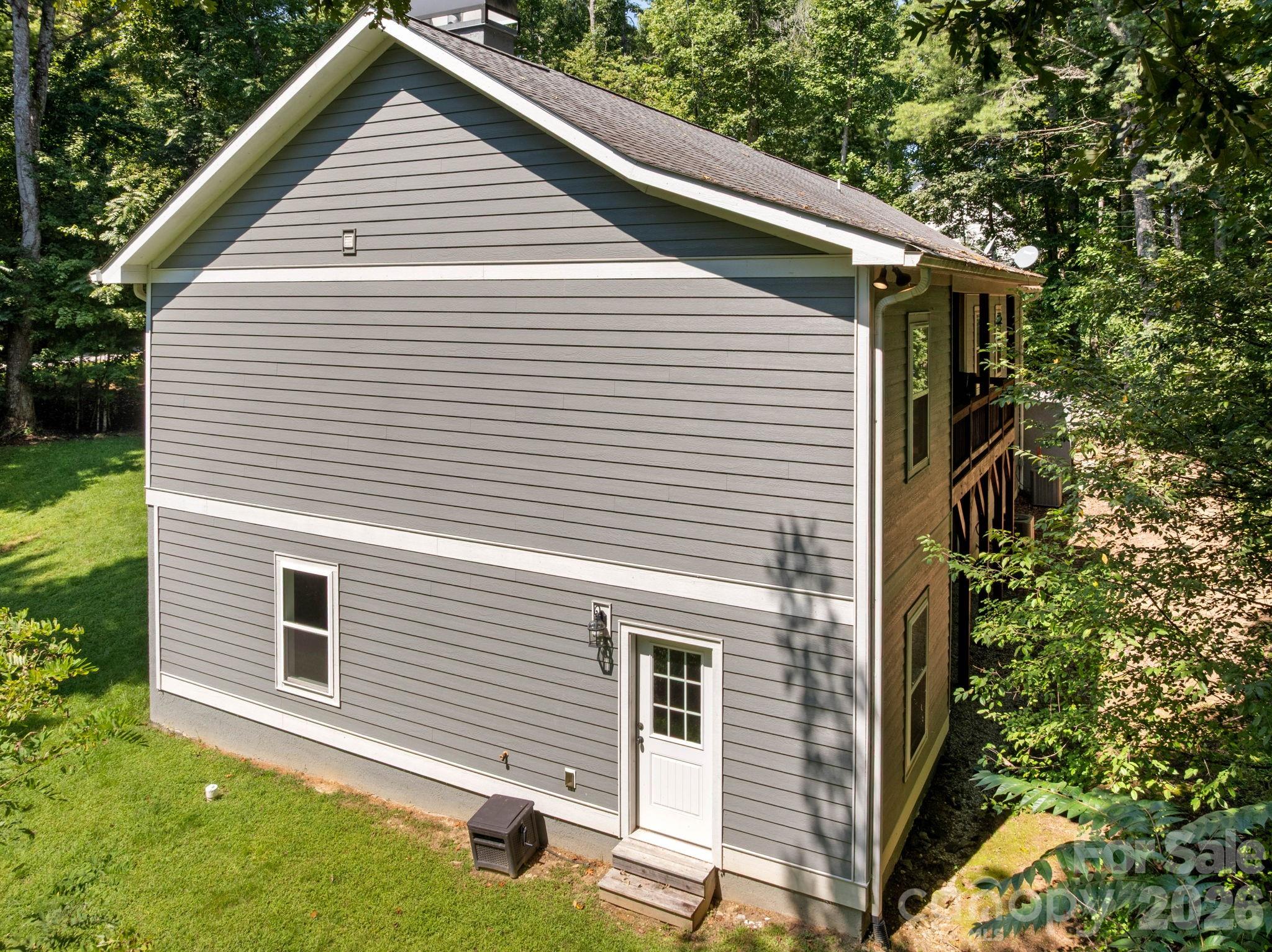 Side of House with Lower Level  Entrance - 72 Summer Shade Court, Hendersonville