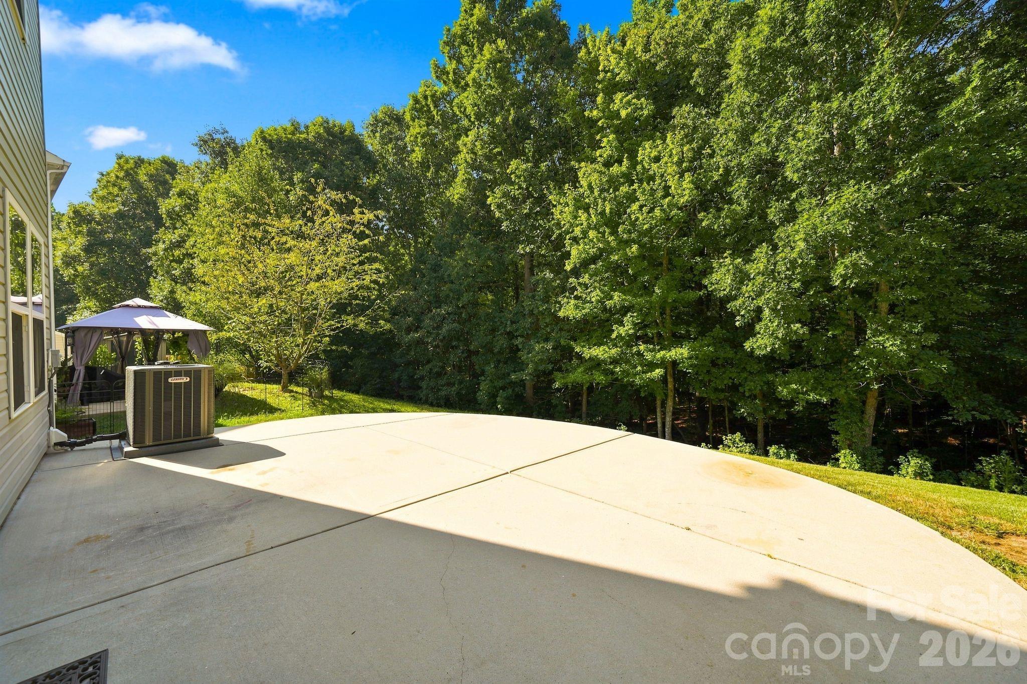back yard is wooded - 422 Danielle Way, Fort Mill