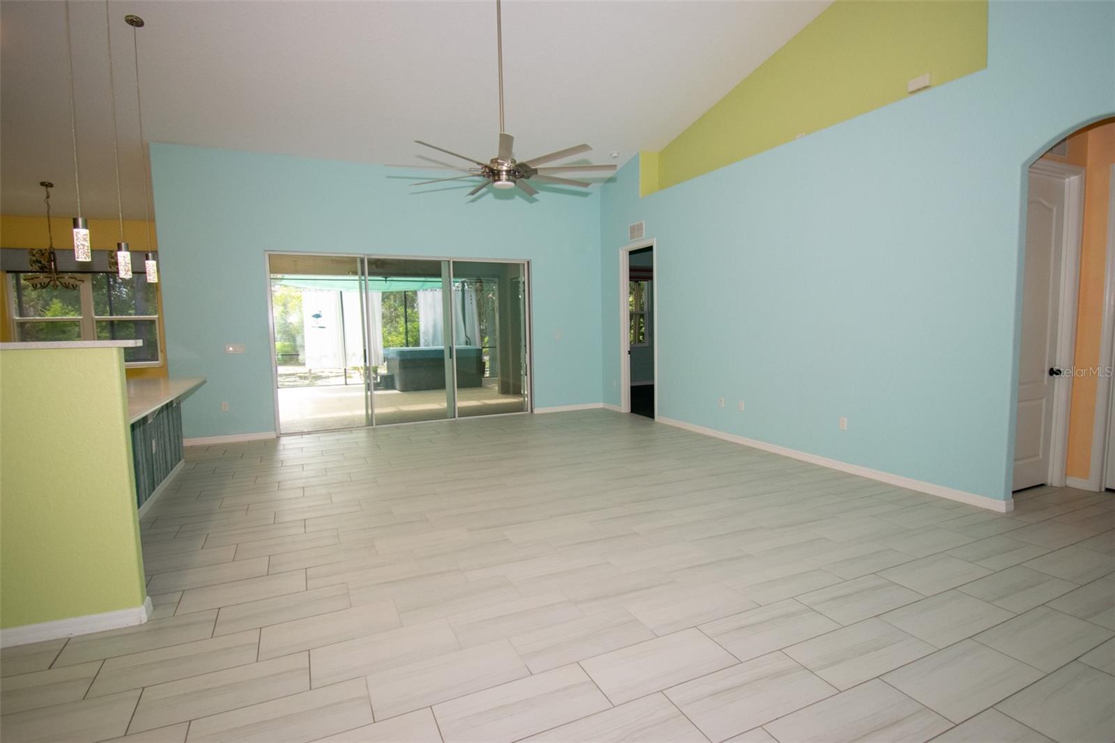 A living room that can be enjoyed even while in the kitchen. - 225 BIRCHWOOD DR, PALM COAST