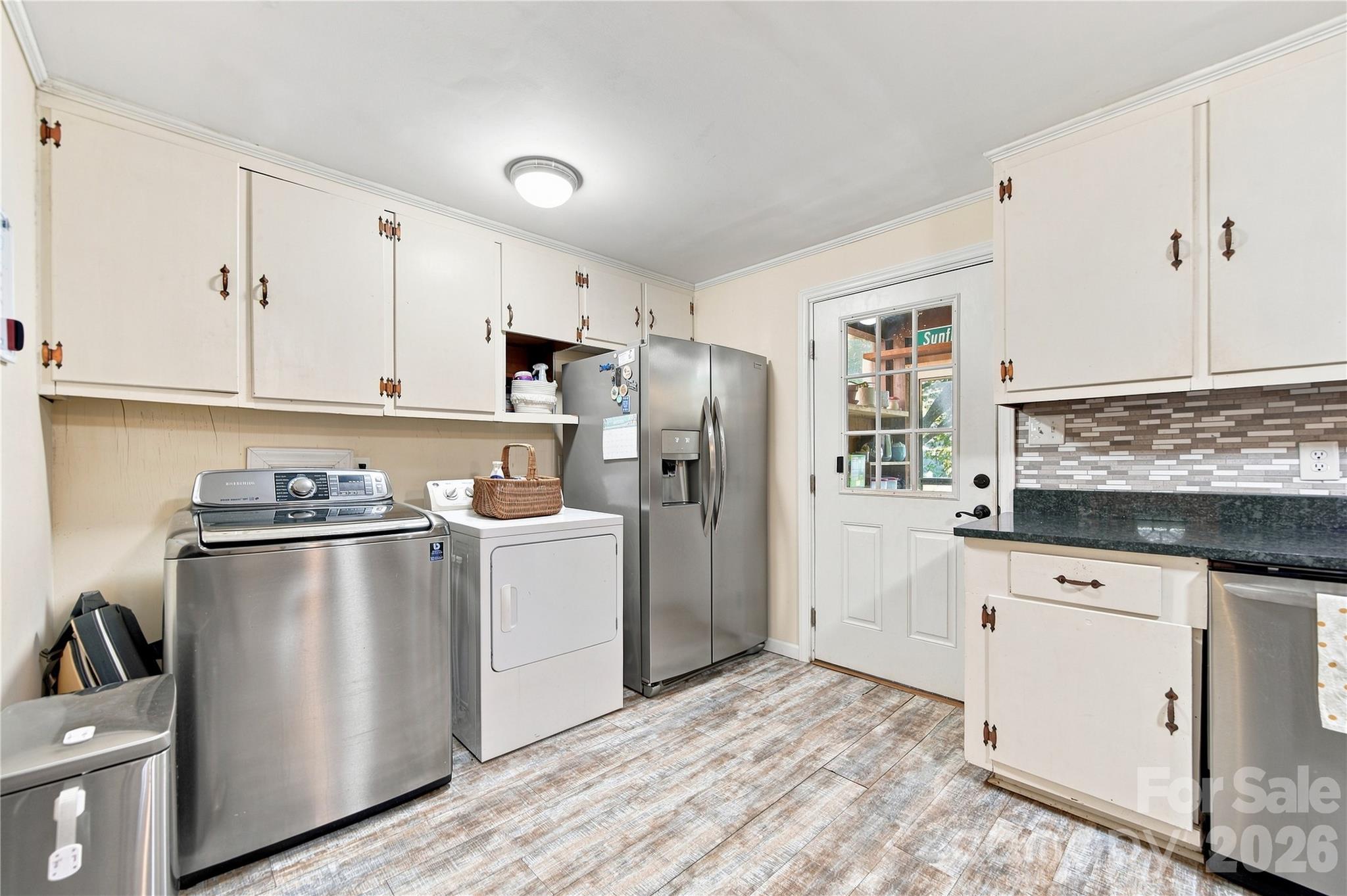 Laundry area - 7704 Otts Circle, Stanley