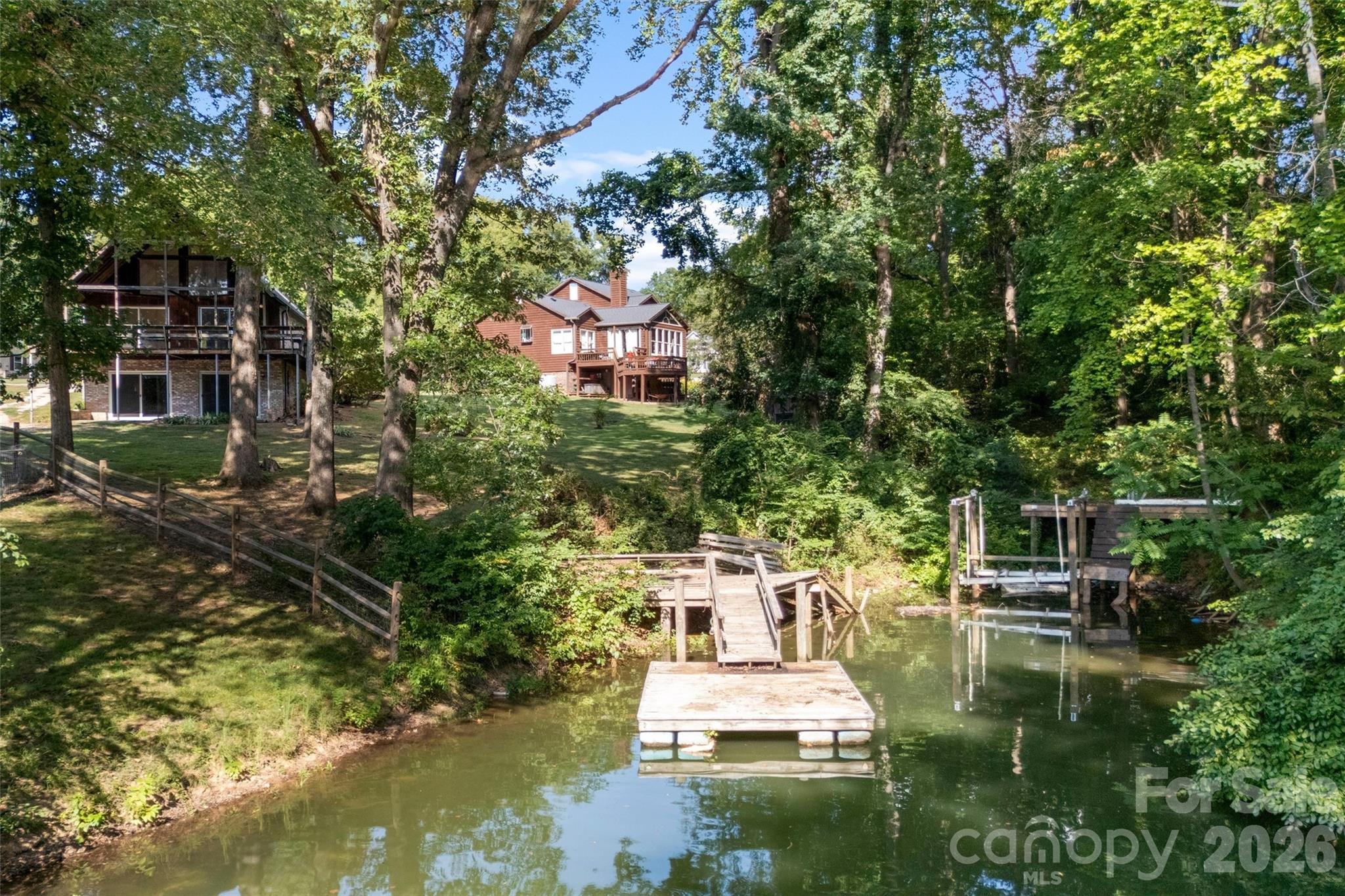 Dock and view of the back of the house - 131 Baywatch Drive, Mooresville