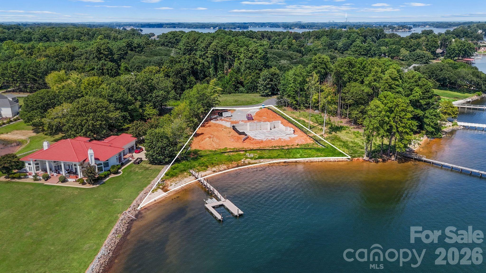 Private cul-de-sac lot on .69 acres with over 250' of shoreline - 7928 Pine Cove Lane, Denver