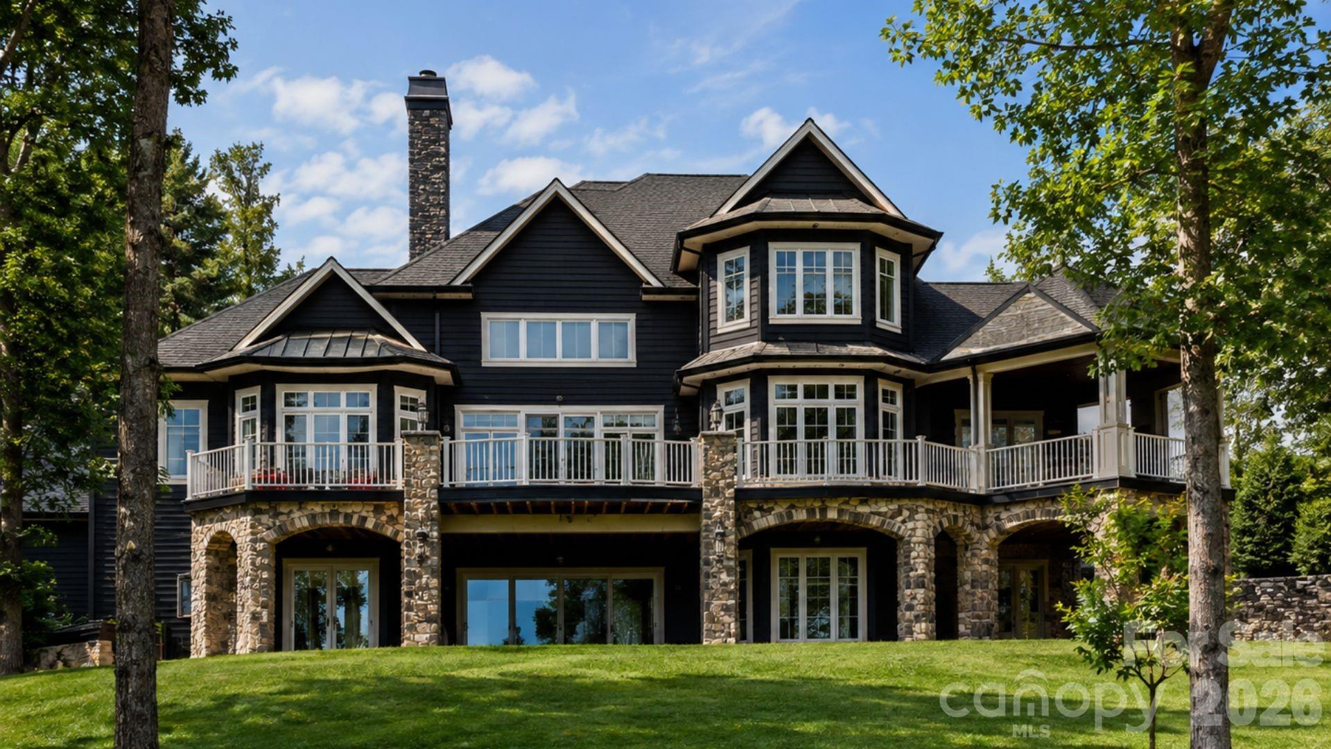Stunning back design with tons of windows to soak in the Lake Norman Views - 7928 Pine Cove Lane, Denver