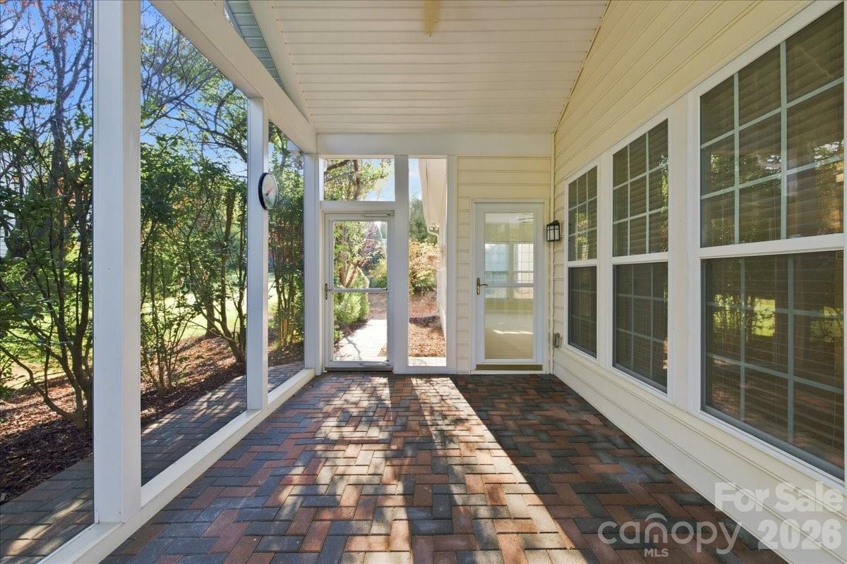 Screen Porch Enjoy your Morning with Filtered Natural Light and View of Nature - 36145 Watsonia Street, Indian Land