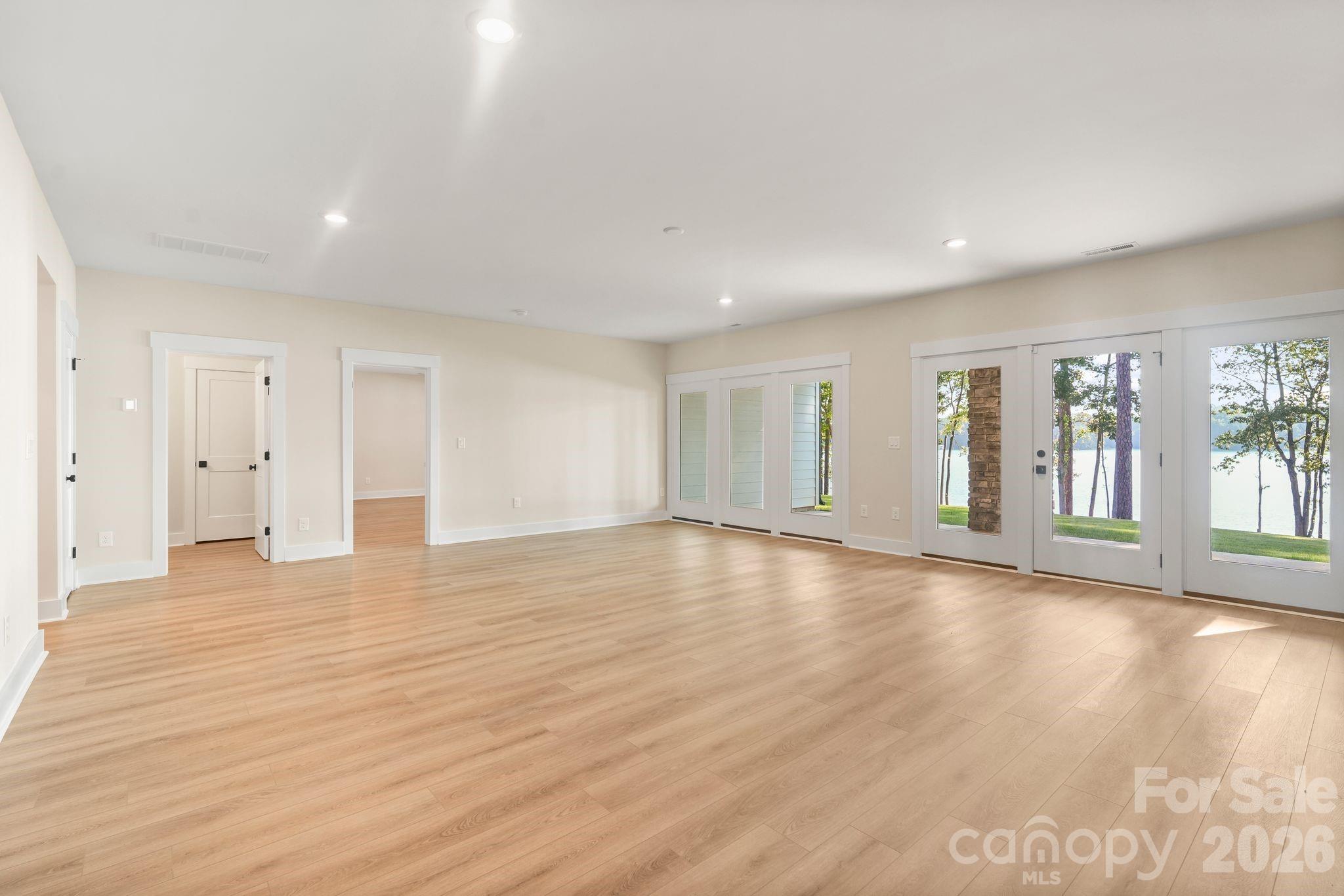 Fully finished walk-out lower level rec room leads to covered back patio - 4531 Splash Trail, Sherrills Ford