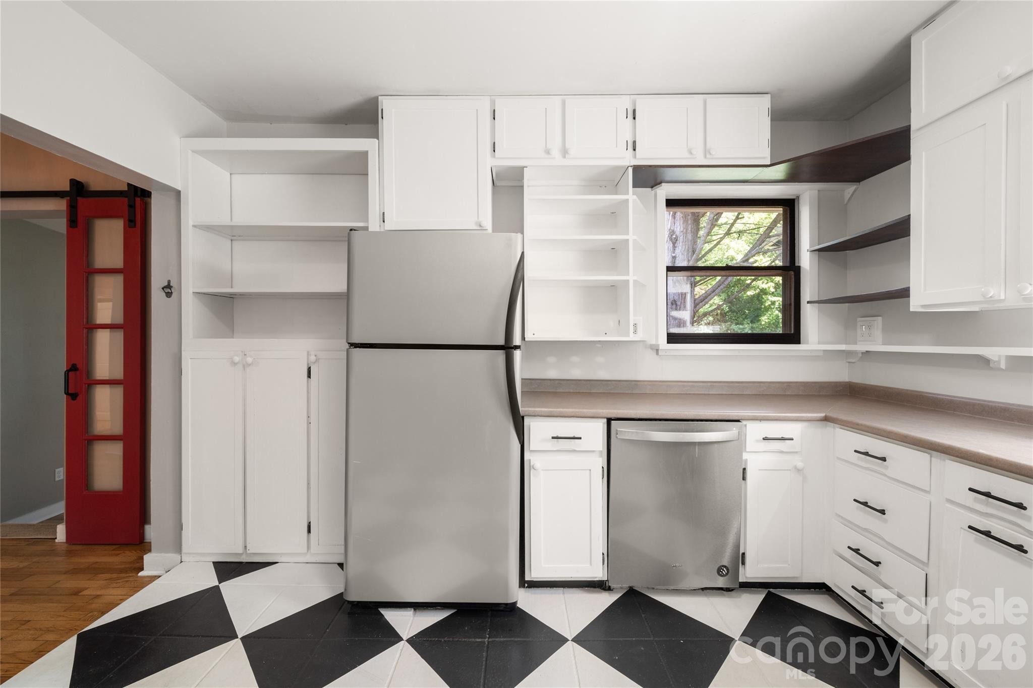 Massive storage with multiple large cabinets and open shelving - 101 Olney Road, Asheville