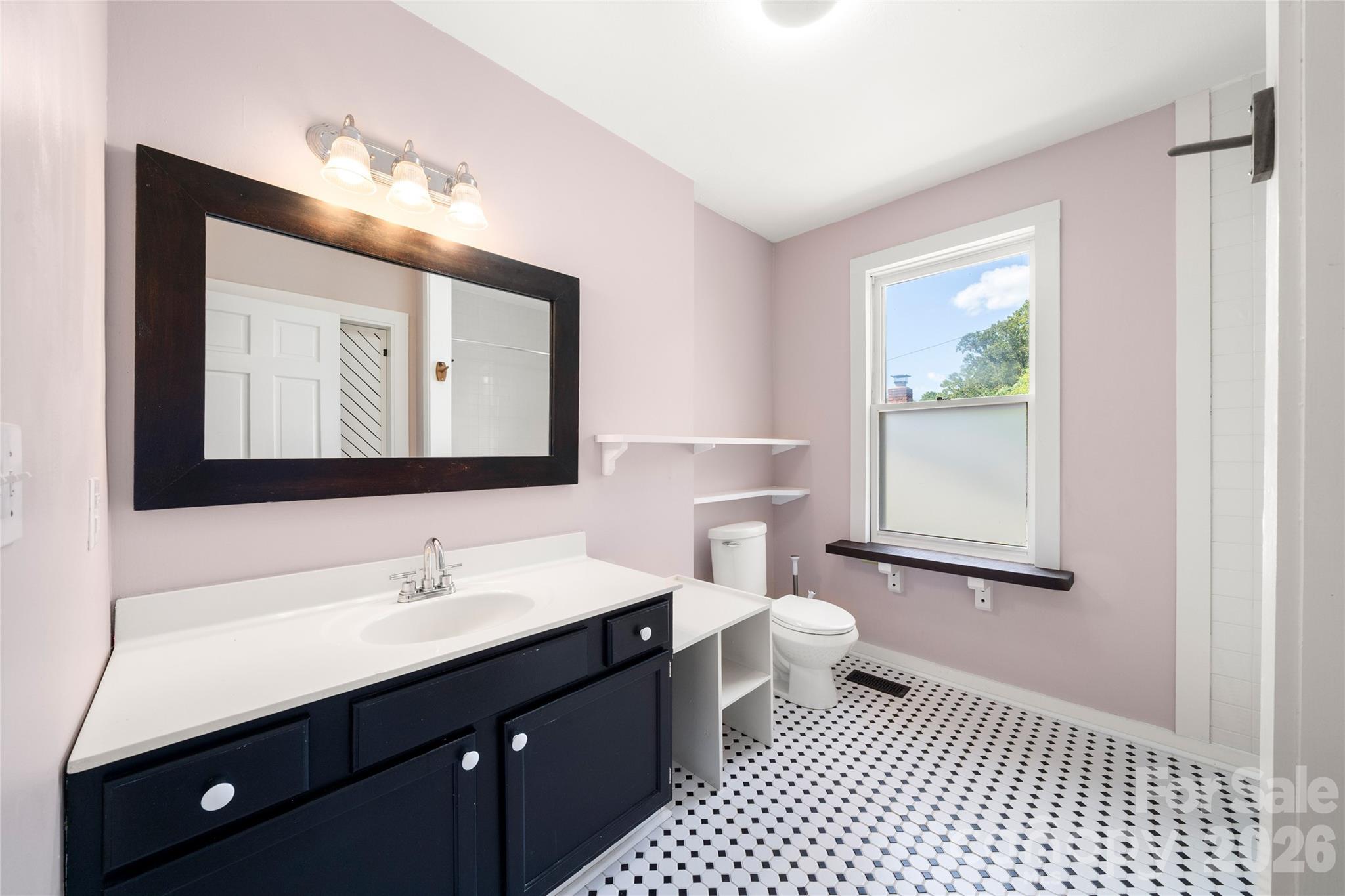 Oversized full bathroom with brand new gleaming floor tile - 101 Olney Road, Asheville