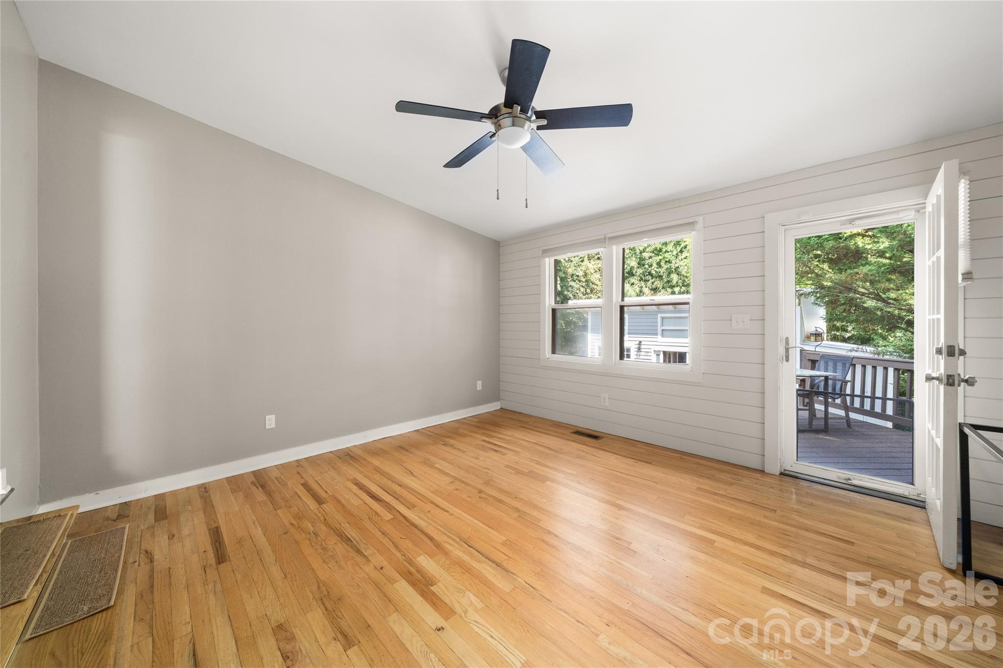 Recreation/flex/family room leads to deck - 101 Olney Road, Asheville