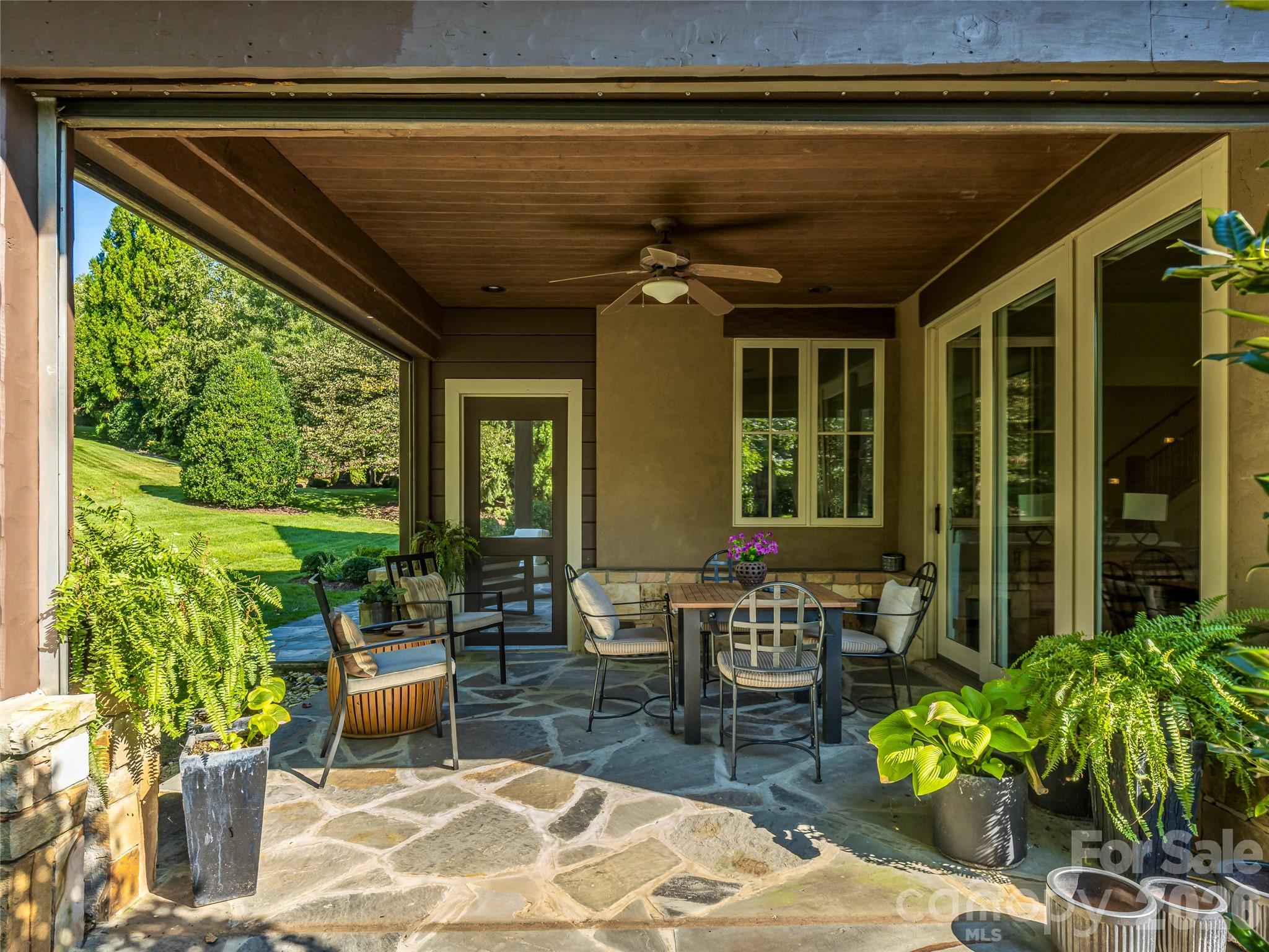 screened in outdoor area - 583 Walnut Valley Parkway, Arden