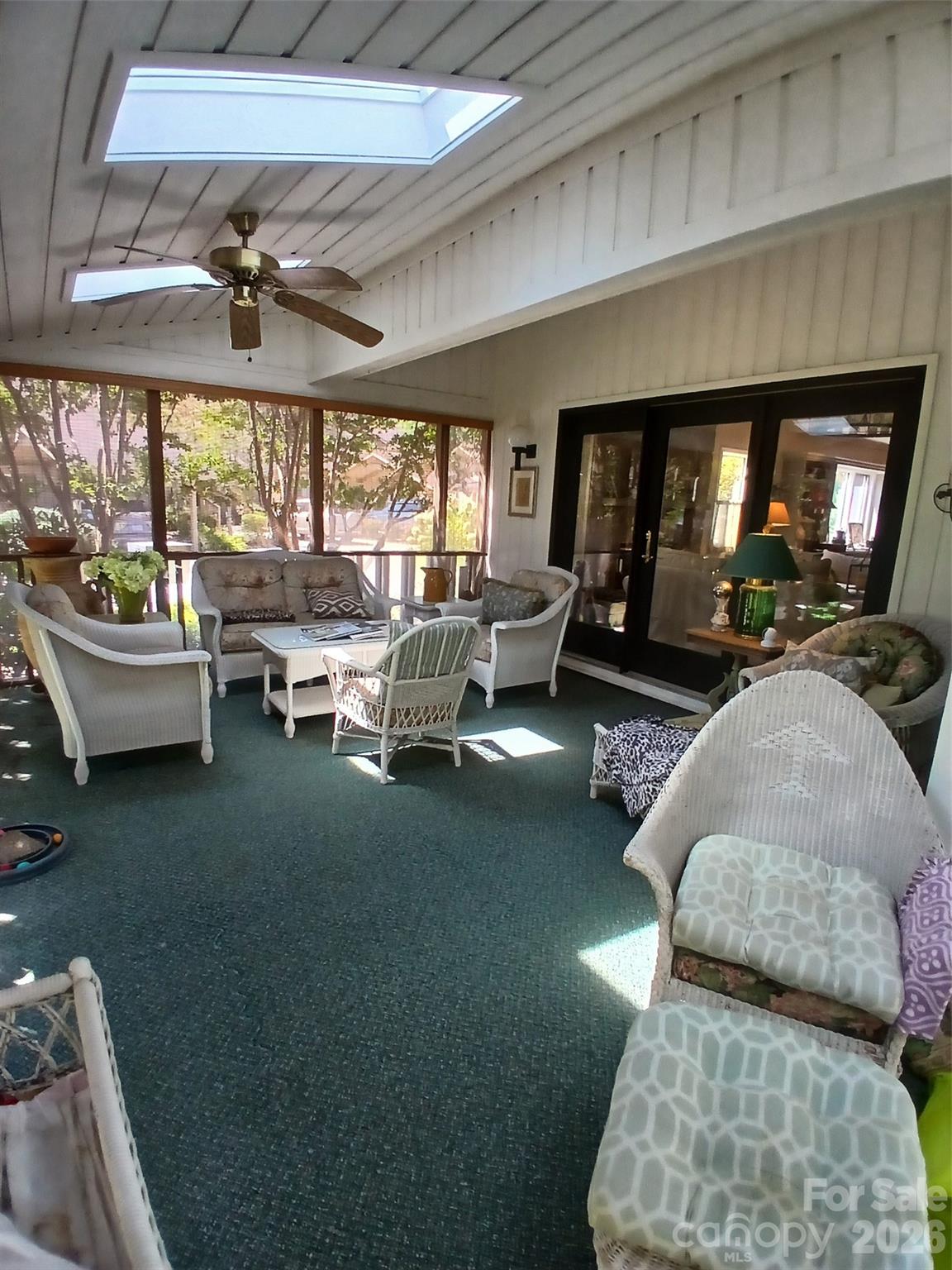 Outdoor screened in porch with slide doors to living room - 304 red oak Drive, Hendersonville