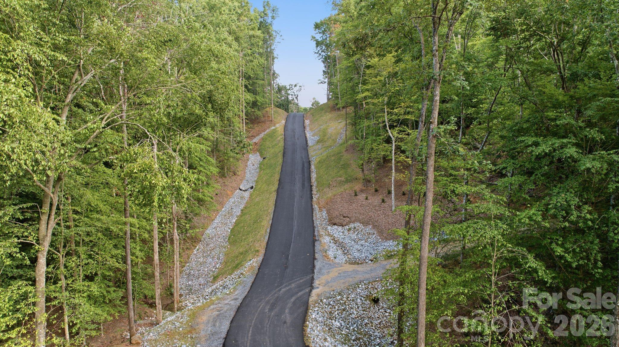Long private road leads to each exclusive homesite. - 216 Windingwood View Lane, Statesville