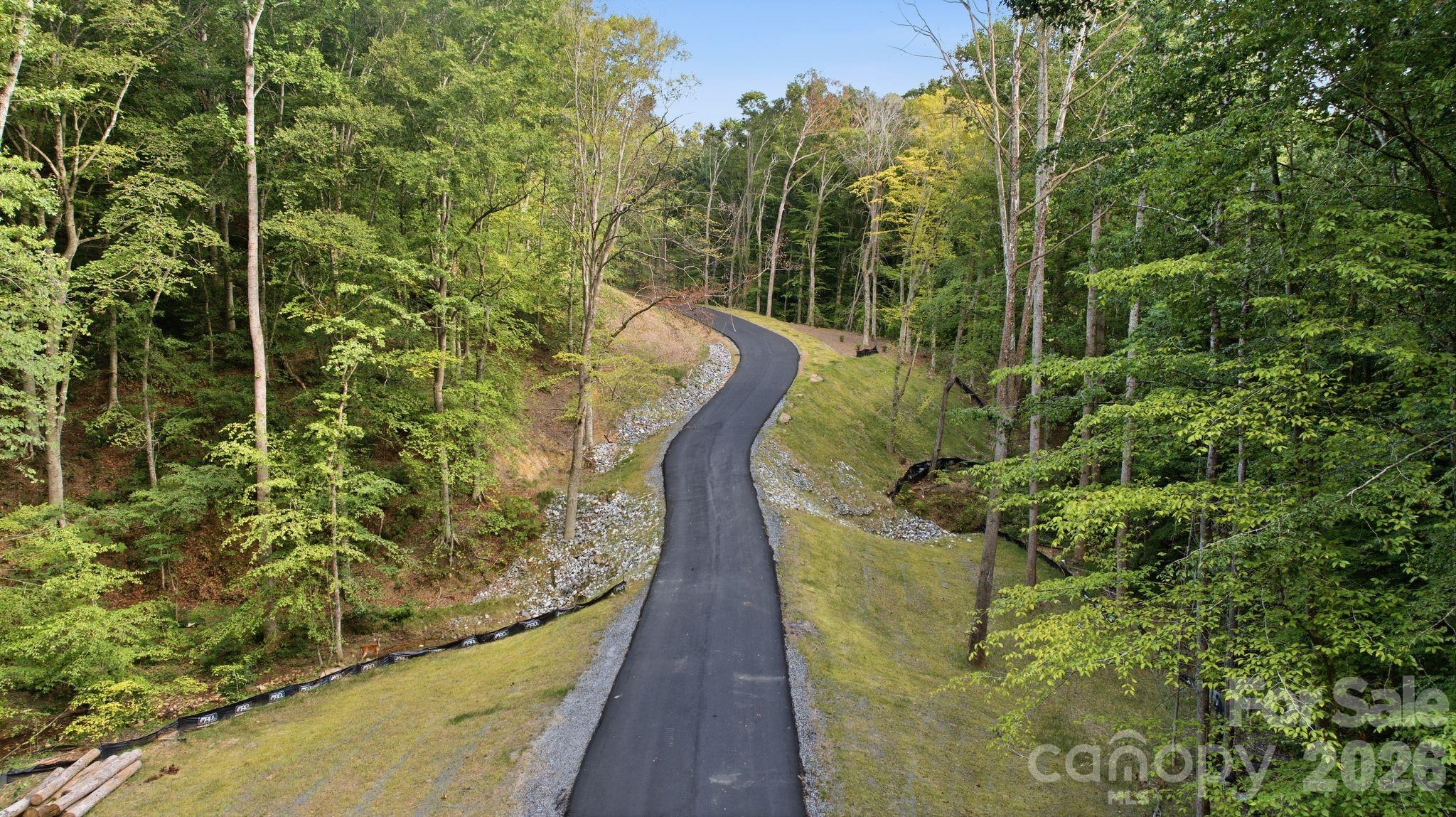 Long private road leads to each exclusive homesite. - 216 Windingwood View Lane, Statesville