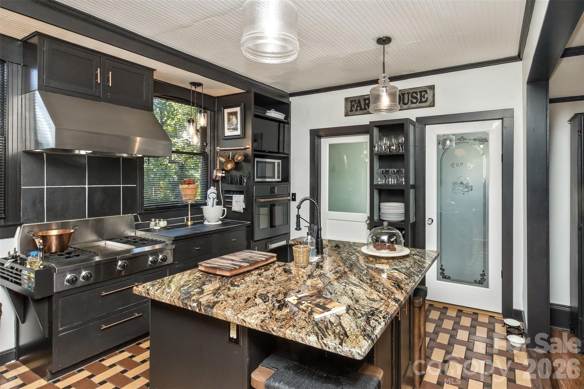 Appliances - large gas stove with wall oven - large hood over stove. - 293 Fairview Road, Asheville