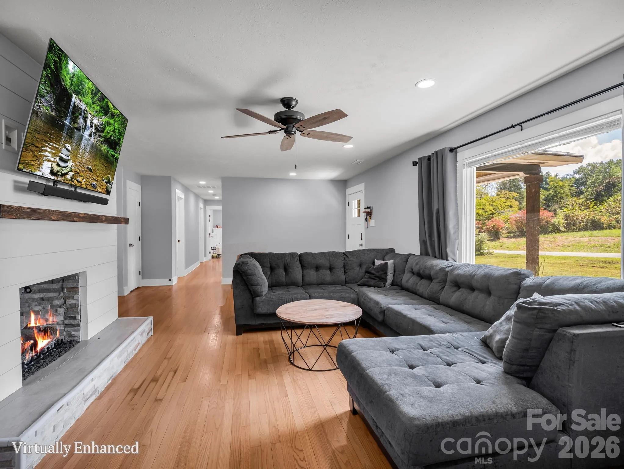 Living room - virtually cleared - 3208 Florida Drive, Hendersonville