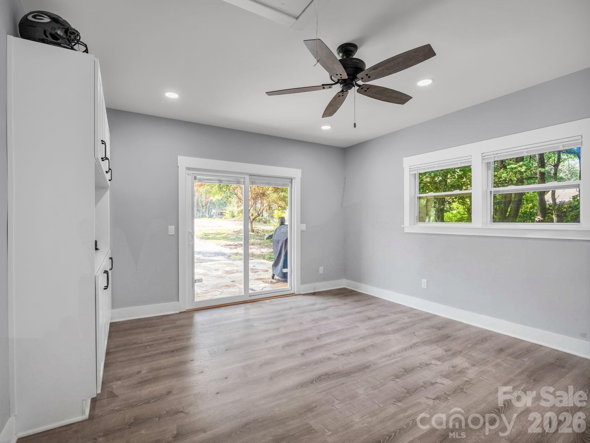 Versatile room off of kitchen could be a home office, mudroom, or man cave - 3208 Florida Drive, Hendersonville