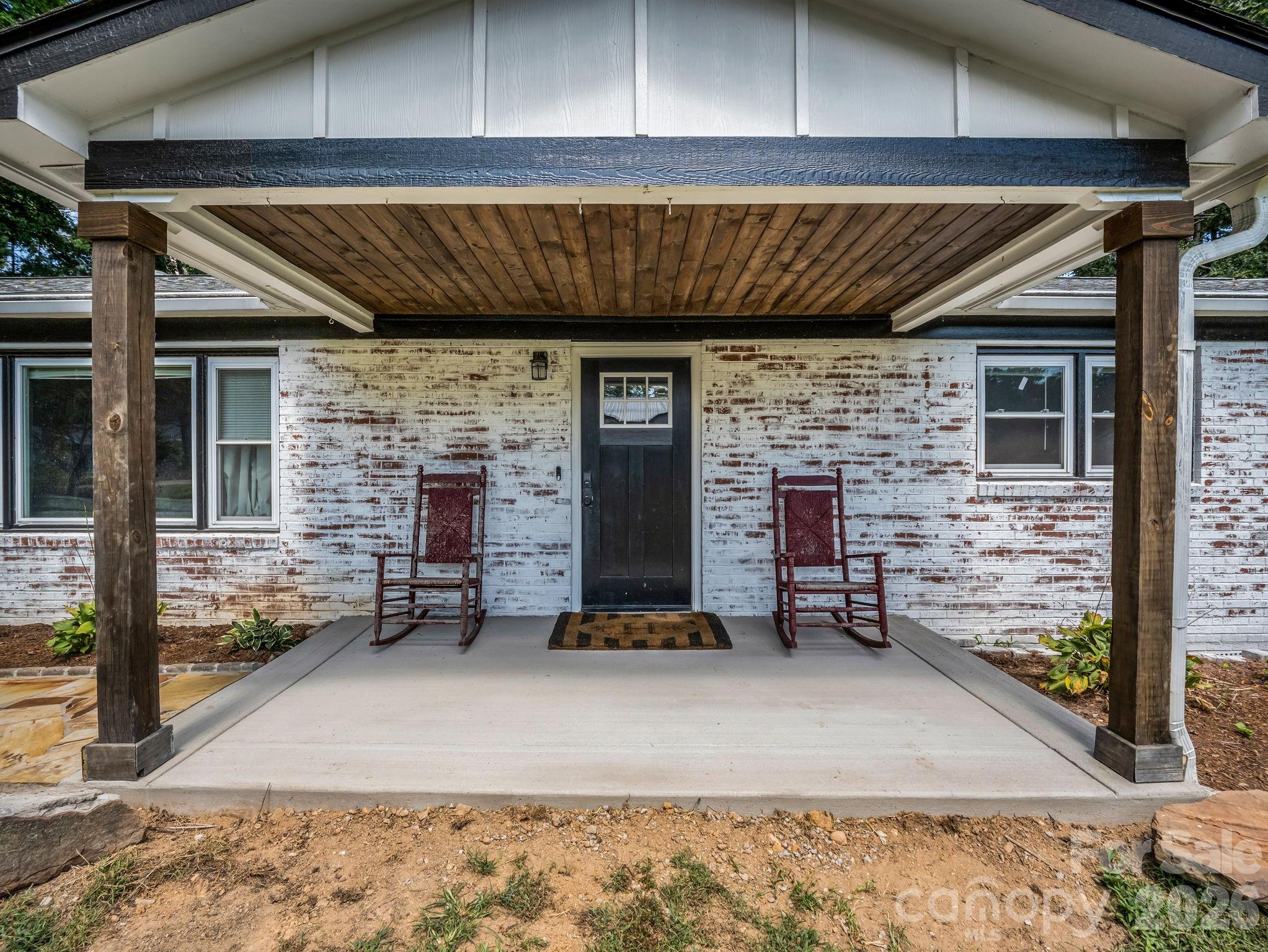 Beautiful porch has recently been repoured - 3208 Florida Drive, Hendersonville