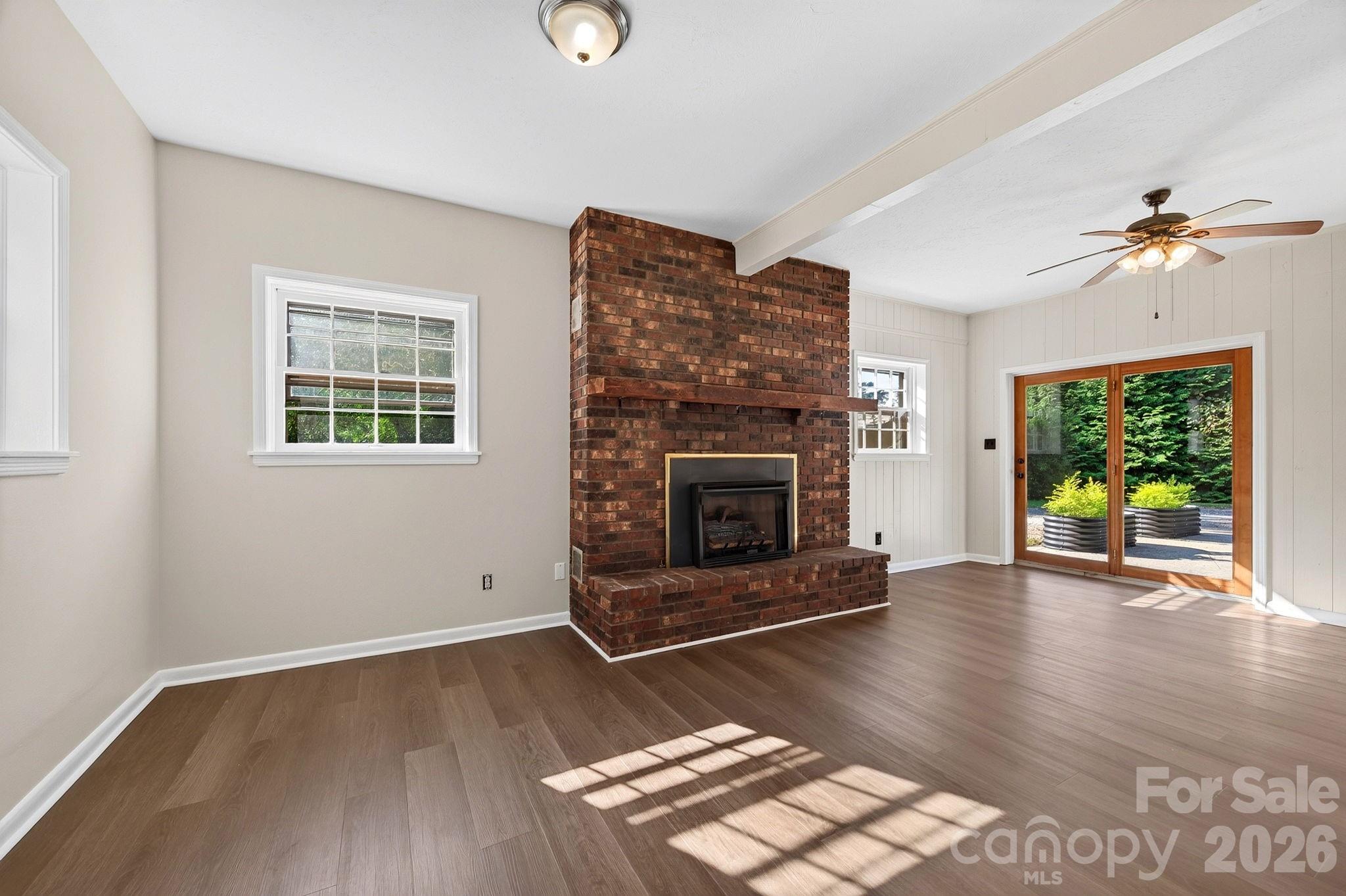 Lower level bonus room has a gas fireplace (gas not connected so sellers have not representation on it's functionality) - 2 Independence Boulevard, Asheville