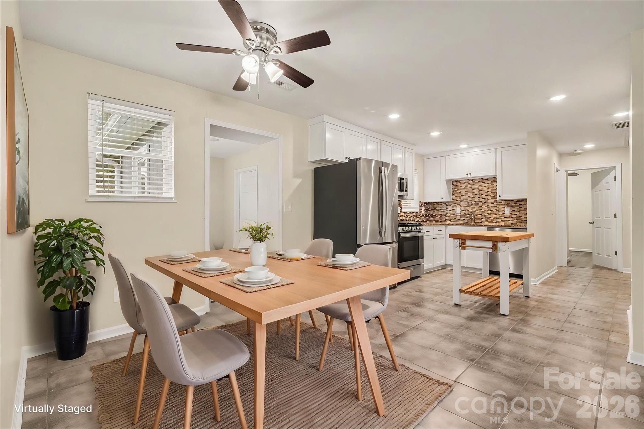 Dining area into kitchen *virtually staged* - 1352 Steed Street, Rock Hill