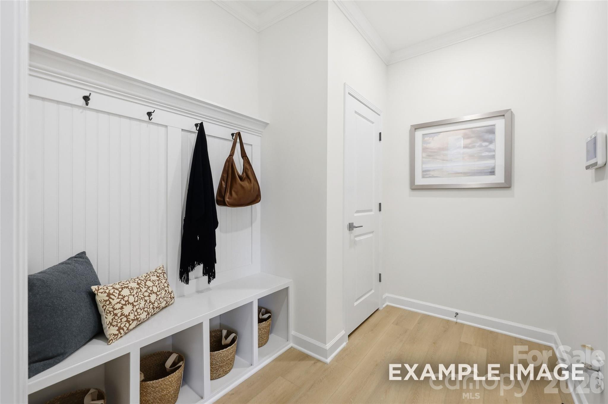 sample photo of mud room bench from garage entry into the home - 2919 Audubon Ridge Drive, Belmont