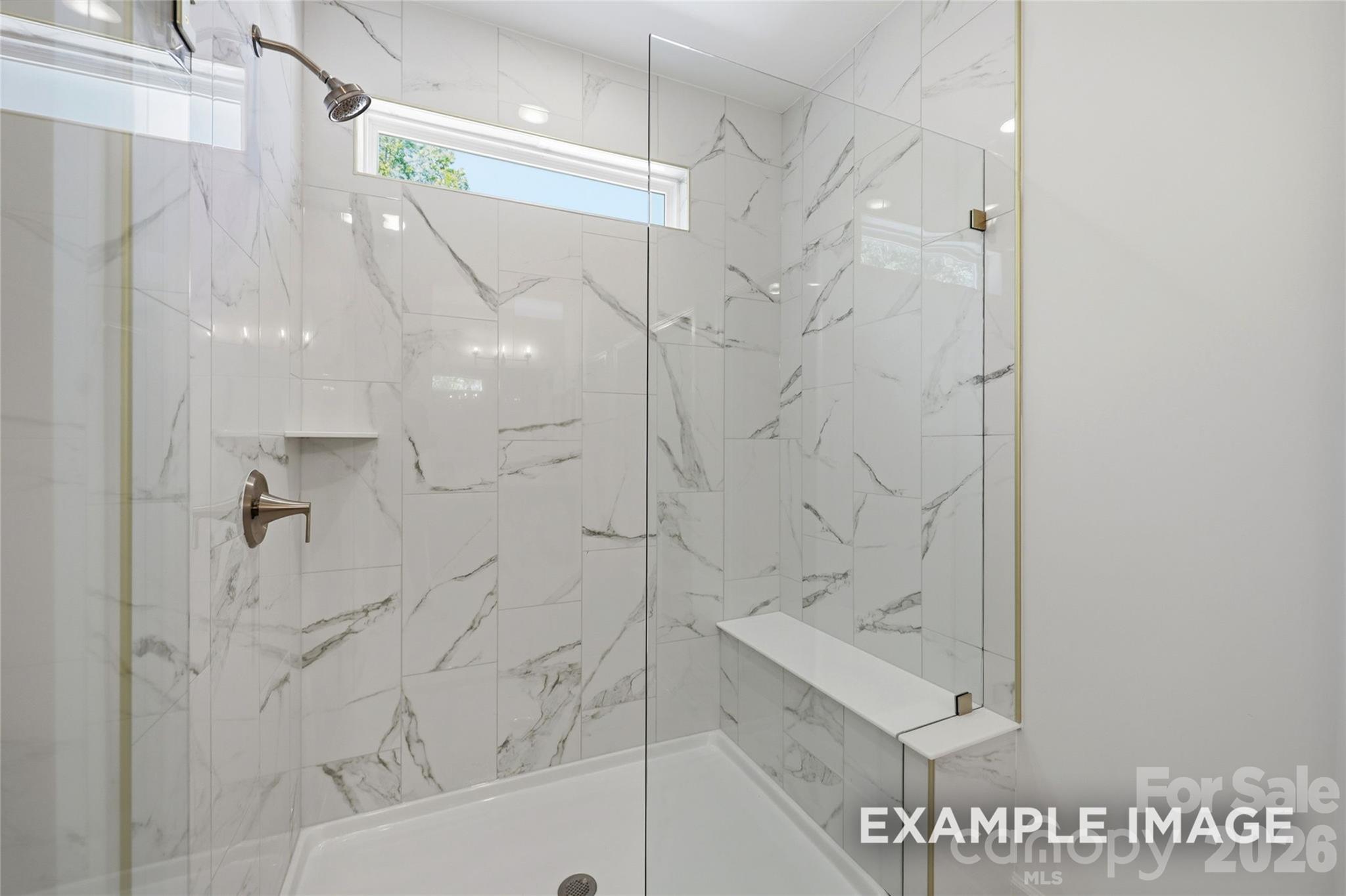 sample owner's deluxe bath shower with bench photo - 2919 Audubon Ridge Drive, Belmont