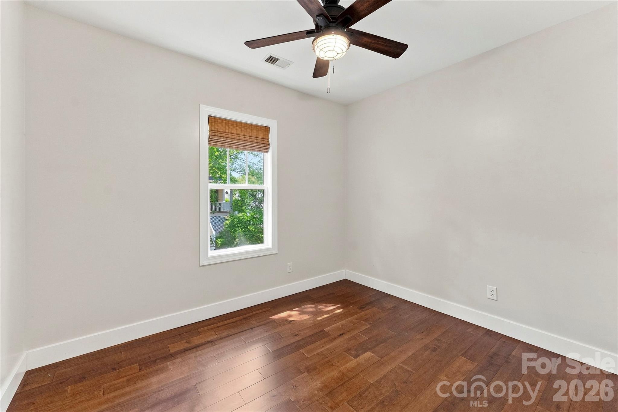 Third Bedroom with hardwood flooring - 14100 Garden District Row, Huntersville