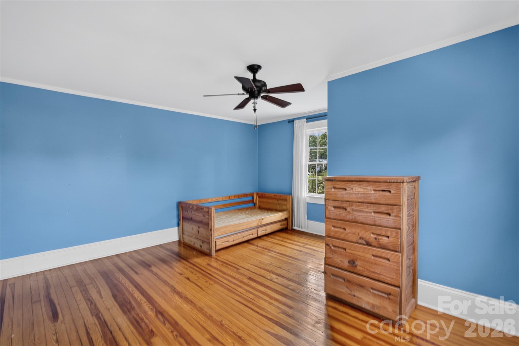 Another view gives a better sense of the impressive size of Bedroom 3 with expansive wall and floor space beyond the current furnishings. - 638 Carolina Avenue, Gastonia