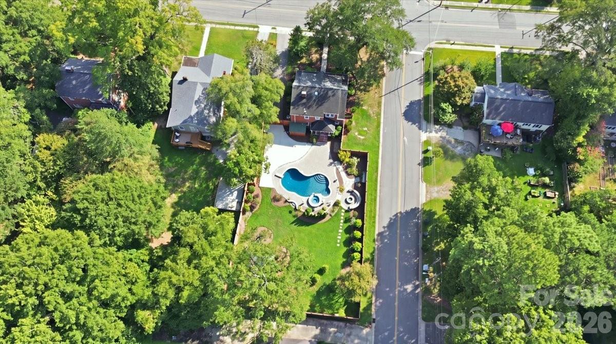 From above, the backyard reveals a private retreat centered around the heated pool, hot tub, and generous surrounding patio. - 638 Carolina Avenue, Gastonia