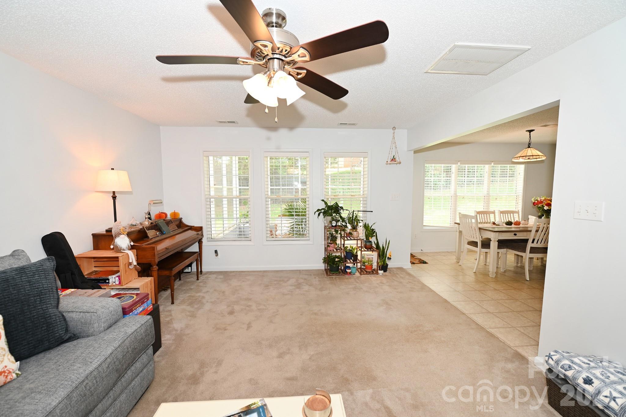 Living room to dining room to kitchen provides great flow for those family get togethers - 236 17th Avenue SE, Hickory