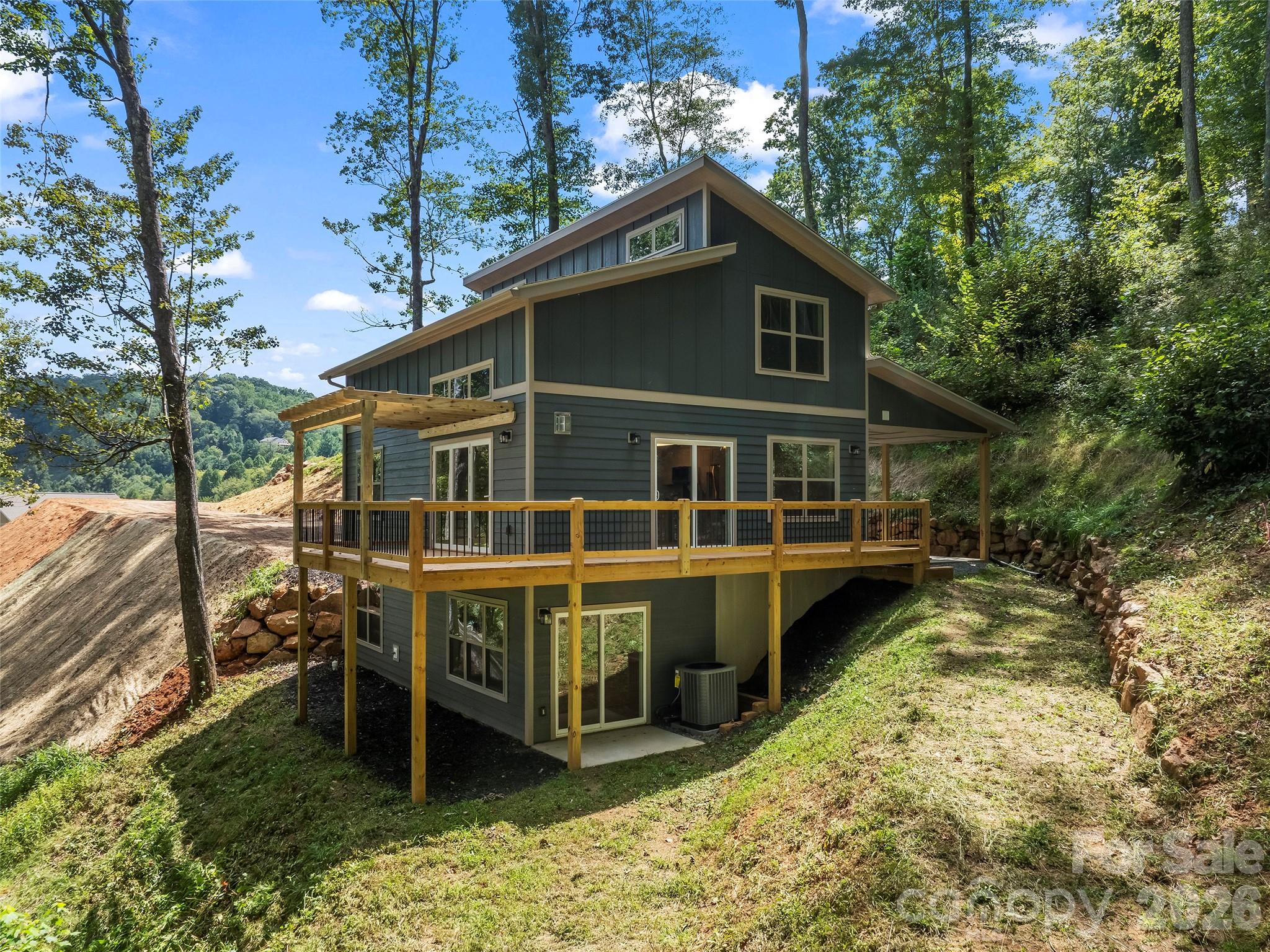 Back yard has space for fire pit - 214 Aster Ridge Drive, Waynesville