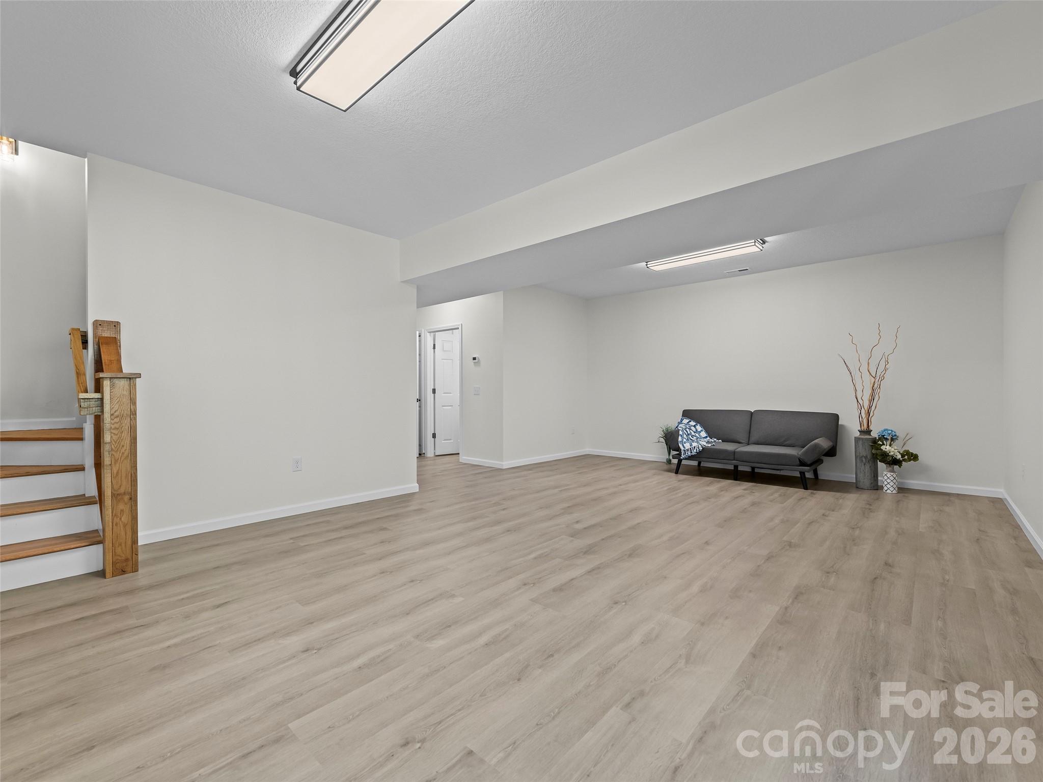 2nd big living room in basement for entertainment - 214 Aster Ridge Drive, Waynesville