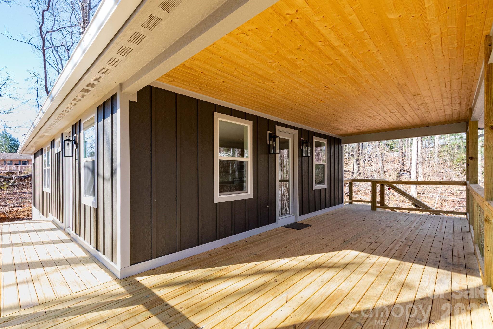 Expansive covered front porch - 137 E Arbutus Trail, Hendersonville