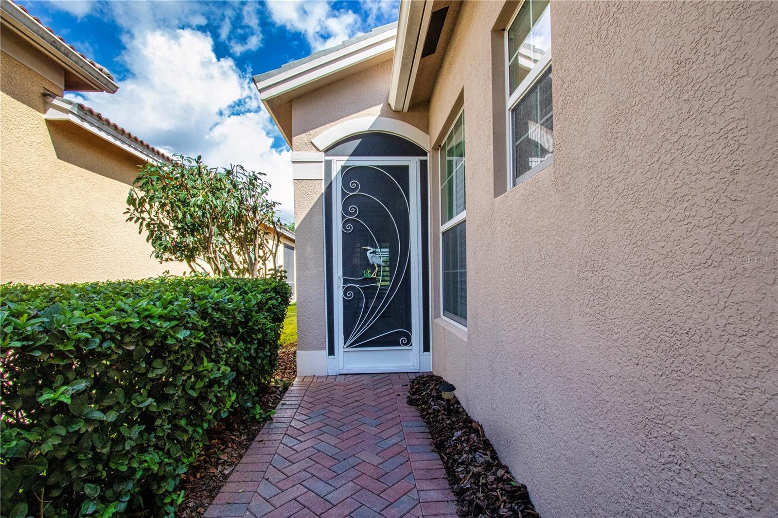 Screened entrance to home - 15847 COBBLE MILL DR, WIMAUMA