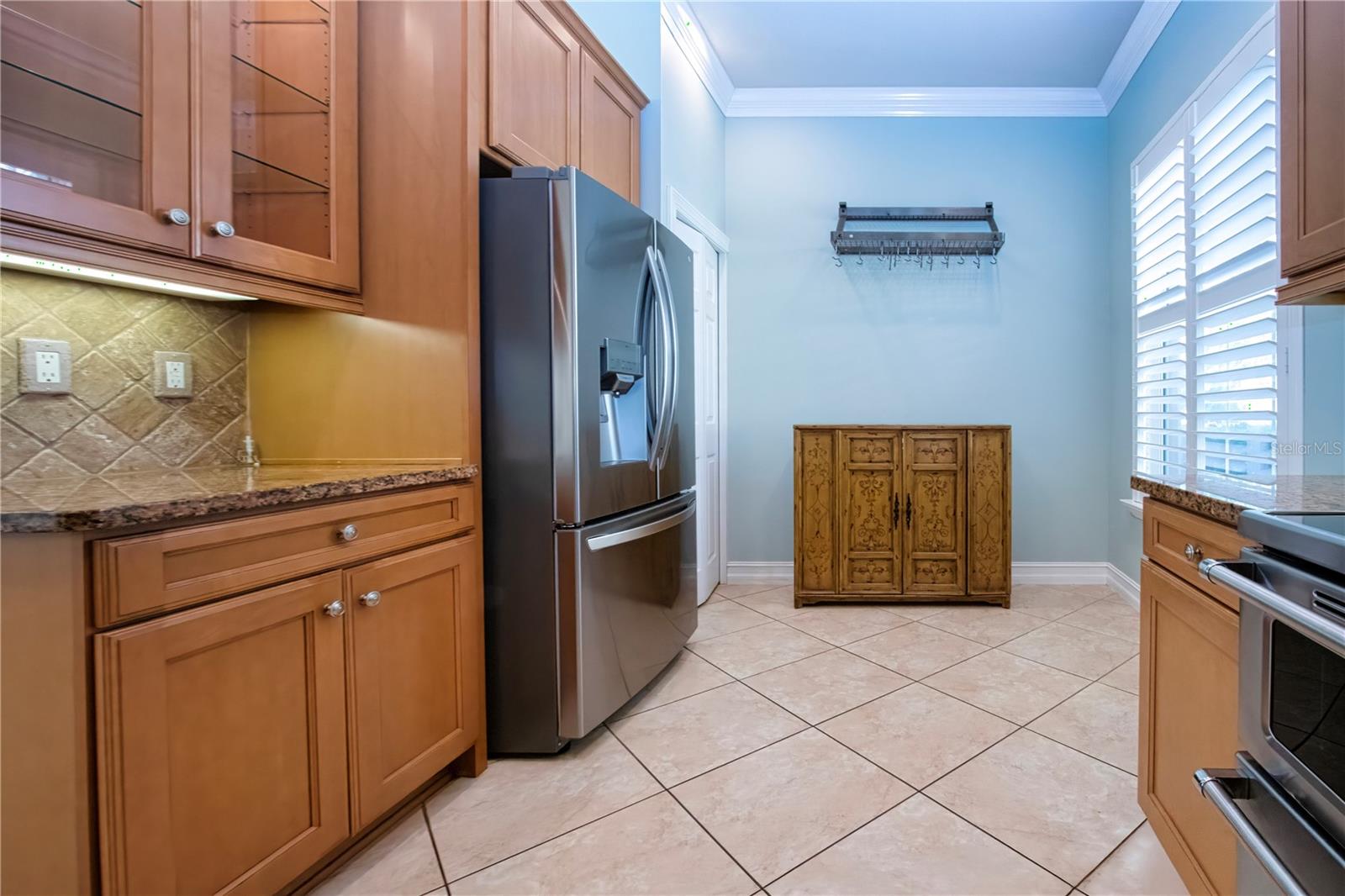 Far end of kitchen can accommodate a dinette table - 15847 COBBLE MILL DR, WIMAUMA