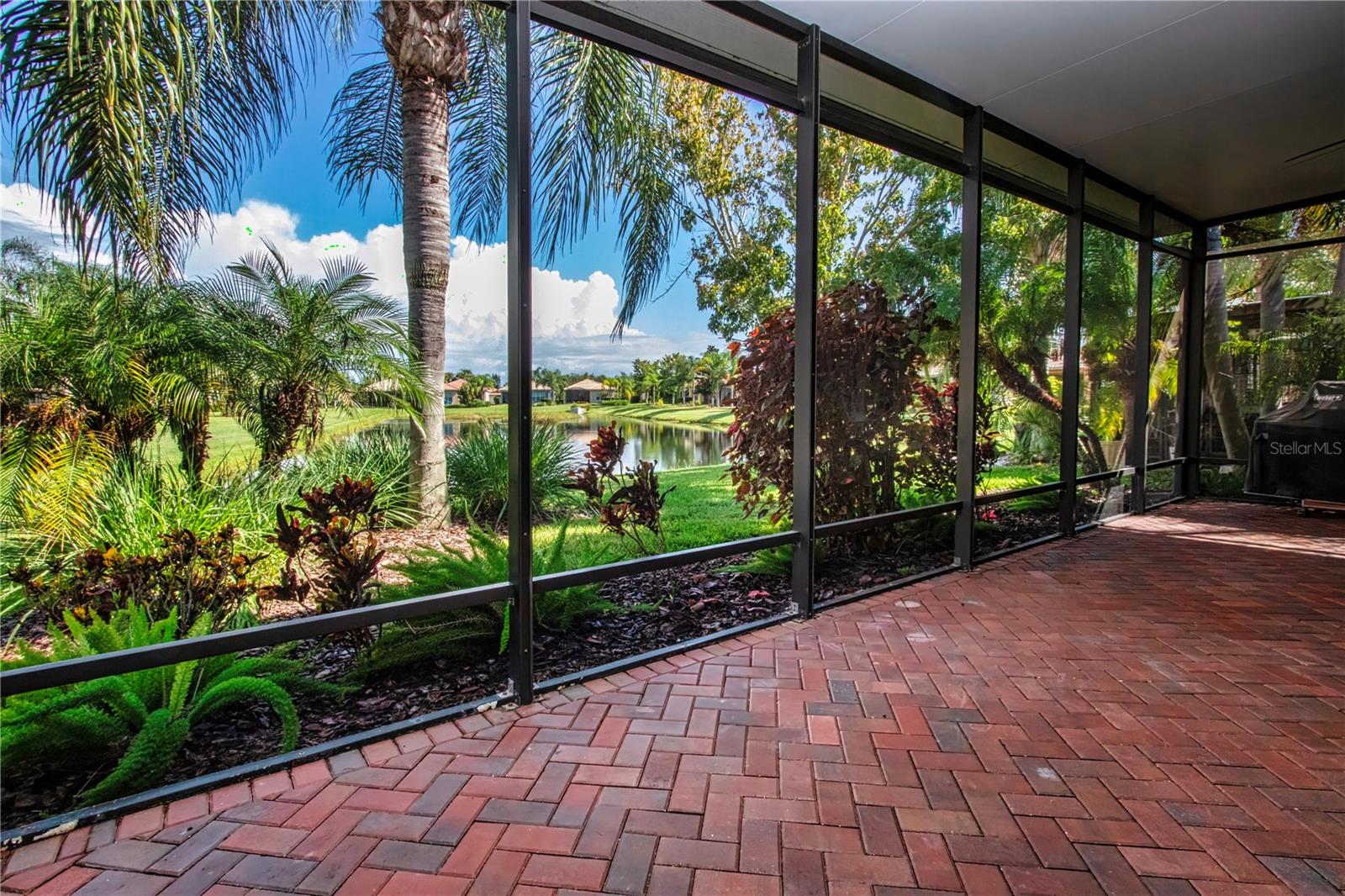 Lanai view - 15847 COBBLE MILL DR, WIMAUMA