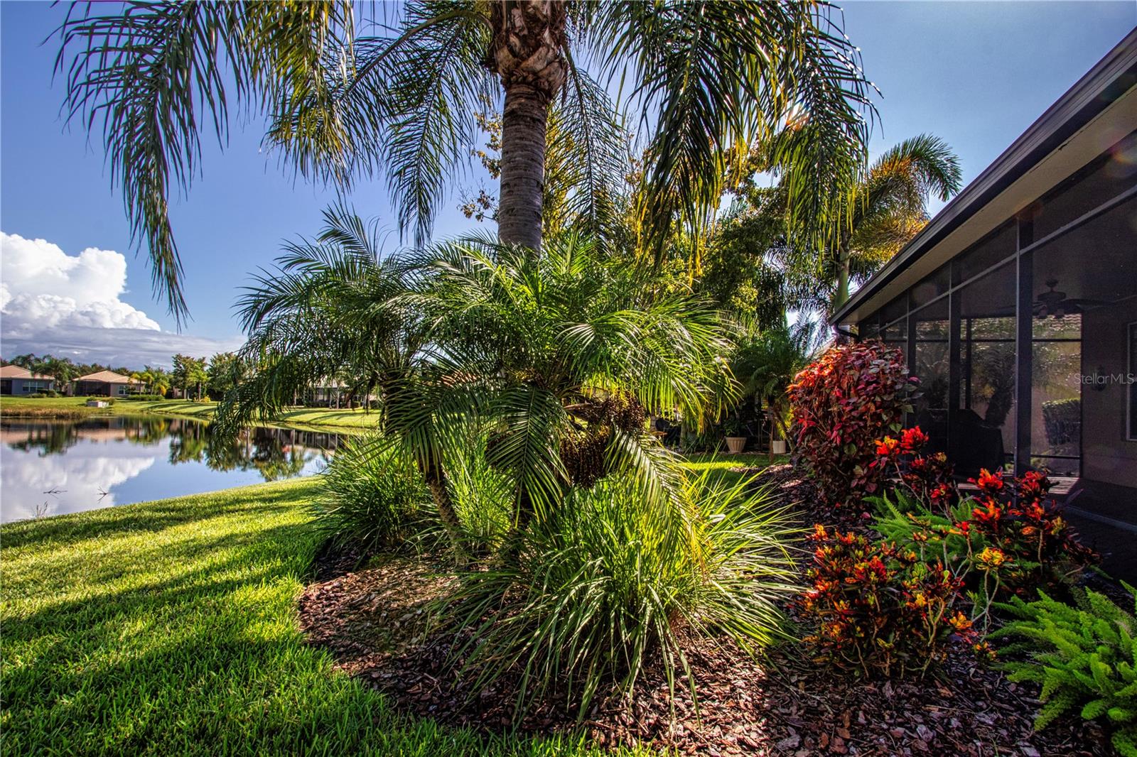 Lovely tropical landscaping maintained by the HOA - 15847 COBBLE MILL DR, WIMAUMA