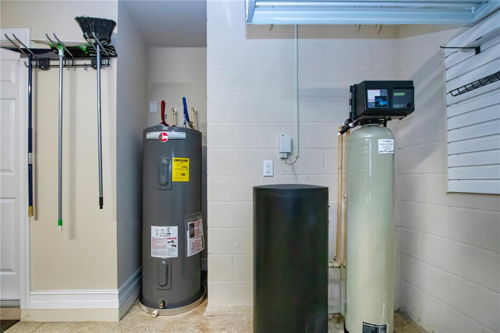 Garage with brand new water heater installed 8.26 - 15847 COBBLE MILL DR, WIMAUMA