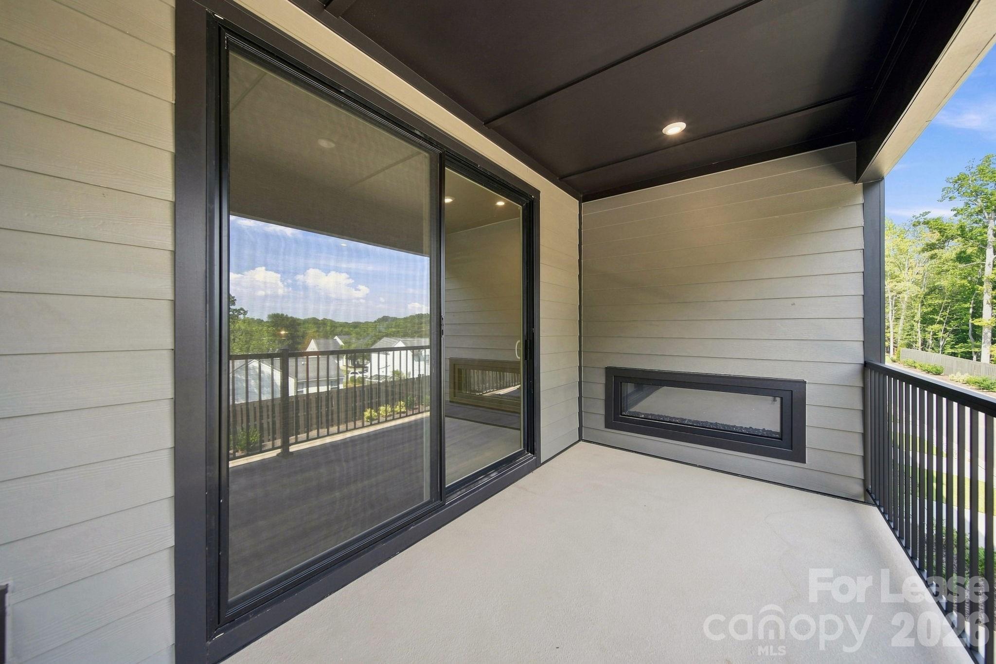 Balcony/Electric Fireplace - 424 Old Town Village Road, Waxhaw