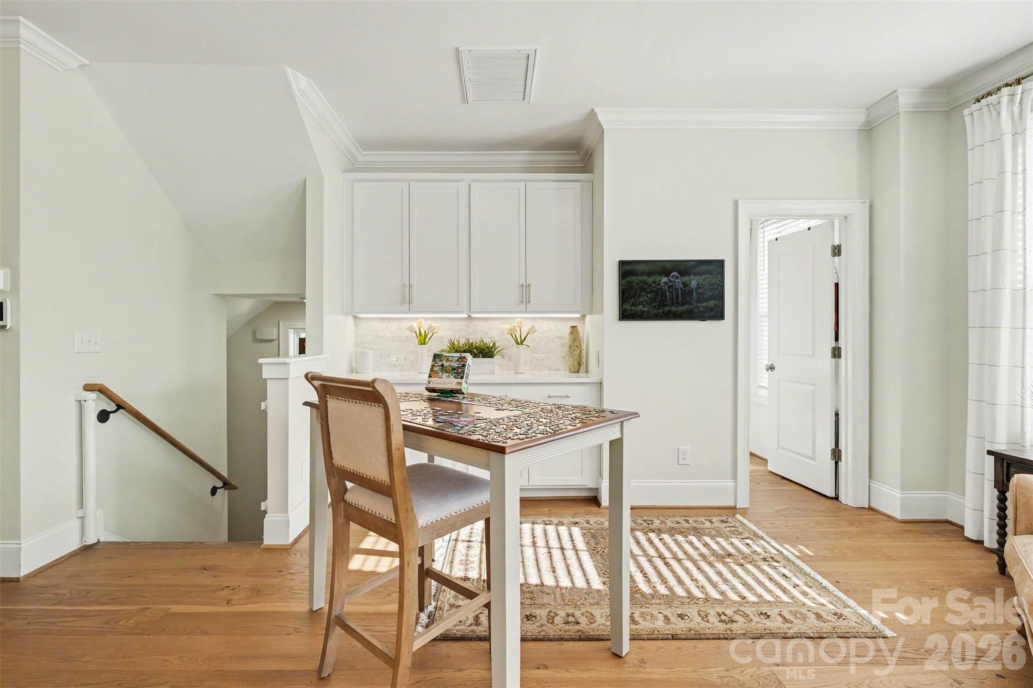 Extra space in the kitchen area... for a puzzle table, reading, relaxing. A nice space to make your own! (And the framed TV stays)! - 3743 Keyworth Way, Indian Land